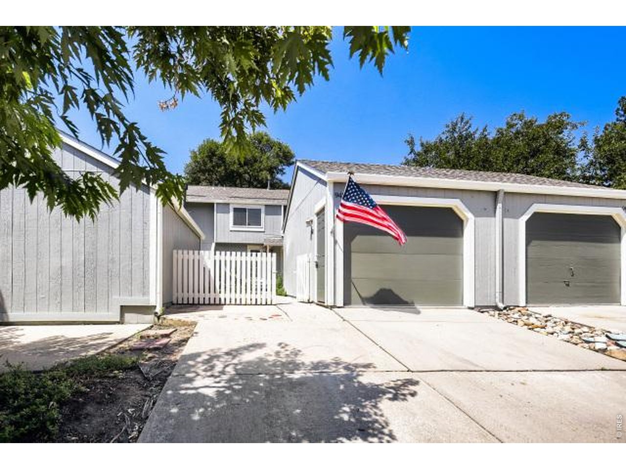 Great location!! Beautifully maintained!! Backs to community open space with views of golf course and mountain range from deck and dining room. Fenced courtyard patio beautifully landscaped. Remodeled all new upstairs bath. Exterior and interior recently painted. Newer roof. Kitchen (eat-in) redone with quartz countertops, new SS sink and faucet, & new dishwasher. Living room fireplace! Carpet cleaned throughout. 3 bedrooms upstairs w/ remodeled all new bath. Basement level has daylight windows -laundry room with laundry tub and storage. Also 1 bedroom and office or workout room. Oversized 1 car garage with work bench, space to park car in front of garage plus 1 dedicated parking space.