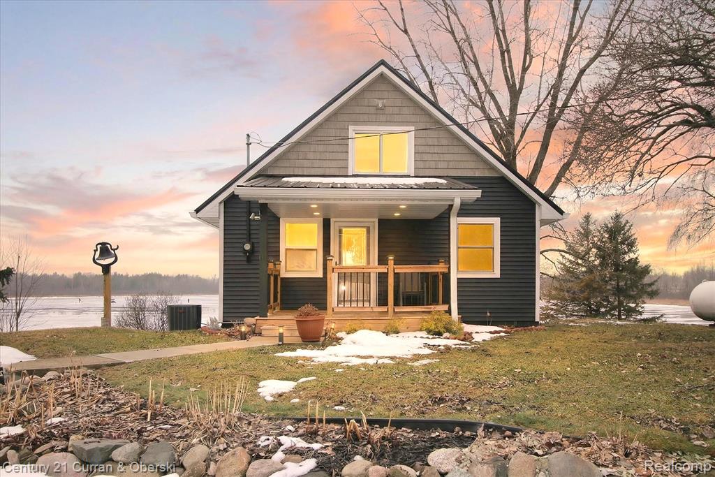 Lakefront Luxury on Private All-Sports Round LakeWelcome to the lake life you’ve been dreaming of—where mornings begin with golden sunrises shimmering across the water and evenings end with laughter around the firepit under painted skies. Set along the shores of private, all-sports Round Lake, this exceptional waterfront retreat offers a rare blend of serenity, recreation, and refined comfort.Spend your days boating, swimming, and fishing from your private dock, or simply soaking in the peaceful rhythm of the water from your expansive deck. Inside, the beautifully updated home is designed to bring the outdoors in, featuring open-concept living, expansive windows, and elegant modern finishes throughout. The gourmet kitchen is the heart of the home—perfect for gathering and entertaining—while the lakeview deck and patio create seamless indoor-outdoor living.The finished lower level, complete with a second kitchen and generous recreation space, offers ideal accommodations for hosting guests and extended stays. With renovations already complete—including a new metal roof, updated flooring,luxury kitchen finishes, and new flooring—this home is truly move-in ready and offered fully furnished for a turnkey experience. Staircase and rear deck have the finest Amish woodworking.Previously operated as a successful Airbnb, it also presents an outstanding investment opportunity, with rental history available upon request.Whether you envision year-round lakefront living or an unforgettable weekend escape, this is more than a home—it’s a lifestyle defined by privacy, beauty, and endless days on the water.