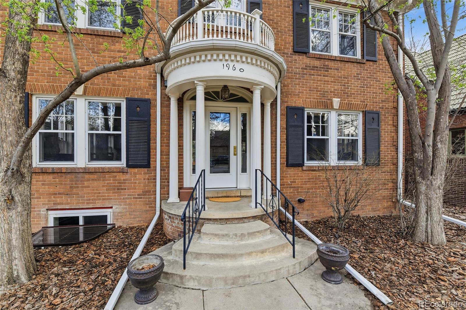 Perfectly positioned in the heart of historic Park Hill, 1960 Leyden offers an unbeatable blend of timeless charm and modern convenience. Just 10 minutes from Downtown Denver and approximately 25 minutes to Denver International Airport, this coveted location places you moments from beloved neighborhood dining including Esters, Park Hill Sushi Co., and Bistro Vendôme. The vibrant energy of nearby Central Park with its shops, parks, and community events is a bonus. Everyday conveniences are effortless with King Soopers, Sprouts, and Spinelli's Market just minutes away. Inside, the home has been thoughtfully reimagined with a stunning chef’s kitchen featuring high end JennAir appliances, striking leathered stone countertops, and beautifully crafted new cabinetry that elevates both form and function. The primary bathroom serves as a spa-like retreat, complete with white marble floors and a luxurious soaking tub designed for quiet moments of relaxation. This five piece bath will be your haven within the home to relax and recharge. Oak floors welcome you to the updated living room with coved ceilings, design friendly fireplace and new lighting. Extending the living space outdoors, a large covered patio creates the perfect setting for year round lounging or al fresco dining, inviting gatherings that flow effortlessly from indoors to out. Whether hosting lively summer dinners or enjoying quiet mornings with coffee, this outdoor space becomes a natural extension of the home’s warmth and livability. This home has touches of original charm as well that has been preserved through the years, like the tile in the upstairs hall bathroom from the 1930's. The backyard is lush and inviting with mature landscaping including perennials, a crabapple tree, redbud, and a large ash tree. Located on a quiet block where Leyden does not run through 17th, this location offers added peace and privacy. This is exactly what home should be!