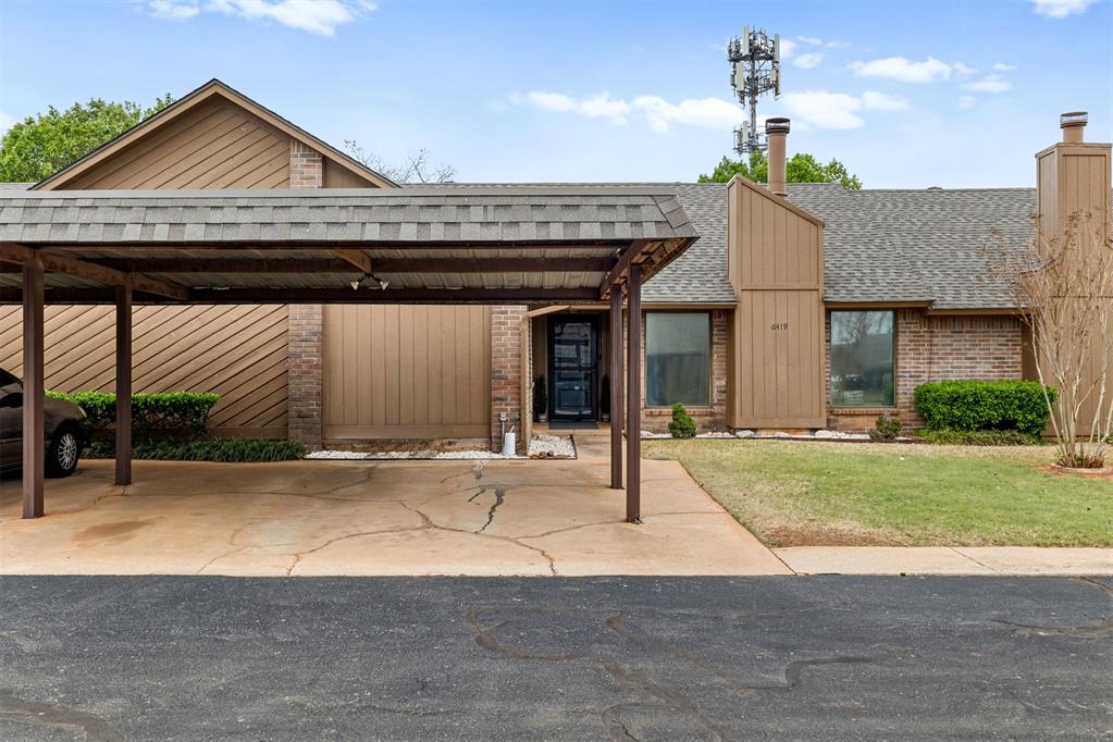 Well-maintained 2 bedroom, 2 bathroom townhome with a functional, open layout and tasteful updates throughout. The inviting living area features a cozy fireplace with a wood-accent surround and abundant natural light from large windows. Durable wood-look flooring flows through the main living spaces, creating a warm and cohesive feel.The kitchen offers ample cabinet storage, updated stainless steel appliances, and a convenient breakfast bar that opens to the living and dining areas, making it ideal for everyday living and entertaining.In addition to the main living areas, a versatile flex space provides options for a home office, dining area, craft room, or additional storage to fit a variety of needs.The spacious primary suite includes an ensuite bathroom and generous closet space. Secondary bedroom provides flexibility for guests or additional living needs.Step outside to a private backyard featuring a wood deck, perfect for relaxing or outdoor gatherings. A storage building in the backyard remains with the property, providing additional storage space. Side fence replacements have been approved by the HOA and are scheduled for installation this spring.Recent improvements include a new roof installed March 2026, offering added value and peace of mind.Additional features include interior laundry and a covered carport for parking.Convenient northwest Oklahoma City location with easy access to shopping, dining, and major roadways.