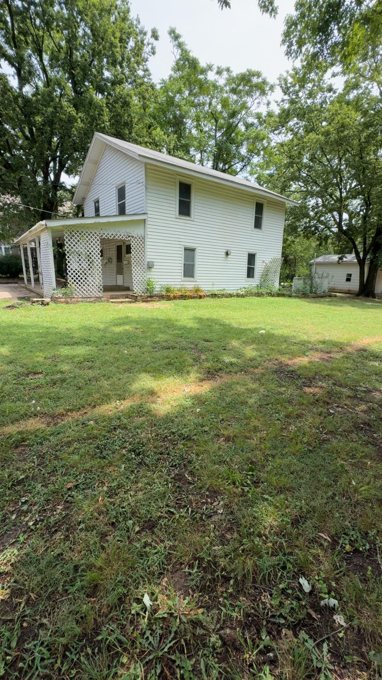 Packed with potential, this 3-bedroom home sits on two lots and is ready for someone to bring it back to life! With a little TLC, this property could truly shine. In addition to the three bedrooms, there are two bonus rooms that offer flexibility for home offices, hobby spaces, or additional sleeping areas (buyer to verify). Outside, you’ll find a good-sized detached garage and an extra vacant lot, providing plenty of room for a garden, shop, play area, or future possibilities. Whether you’re an investor or a buyer looking for a project, this property offers a great opportunity. Cash or conventional financing is likely the best fit. Come see the potential for yourself!
