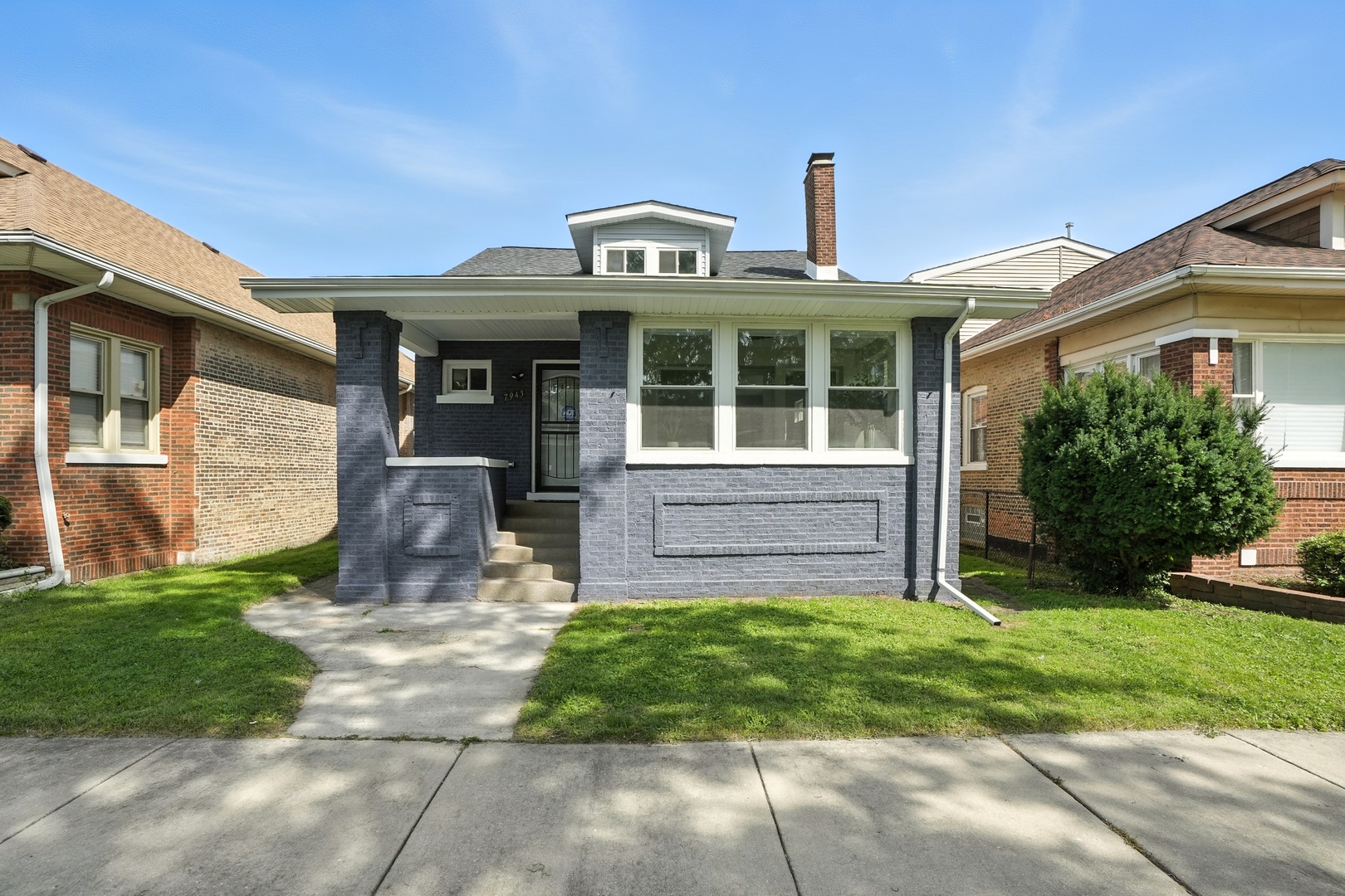 Classic Chicago Brick Bungalow - Newly Envisioned for 2025!  Step into timeless charm with a modern twist at 7943 S Bennett. This beautifully reimagined home offers 4 spacious bedrooms, 2.5 baths, and a design that blends traditional architecture with contemporary comfort. Features include, Primary suite on the main floor with private ensuite bath. Modern enclosed four-seasons room for year-round enjoyment. Full finished basement for entertaining or additional living space. Fully refreshed systems: new windows, water heater, furnace, and central A/C . Brand-new stainless steel appliances, dishwasher, stove, refrigerator, microwave to be installed prior to inspection. Neutral tones throughout, creating a clean, inviting canvas for your personal style. Local Lifestyle Perks: Located near Jackson Park, offering expansive green space, beaches, and the Museum of Science & Industry. Coffee & Cafes: For your morning pick-me-up, and loads of fitness and wellness opportunities.    Experience the effortless balance of comfort and convenience in this turnkey home-where historic charm meets modern living, and every essential is within reach.