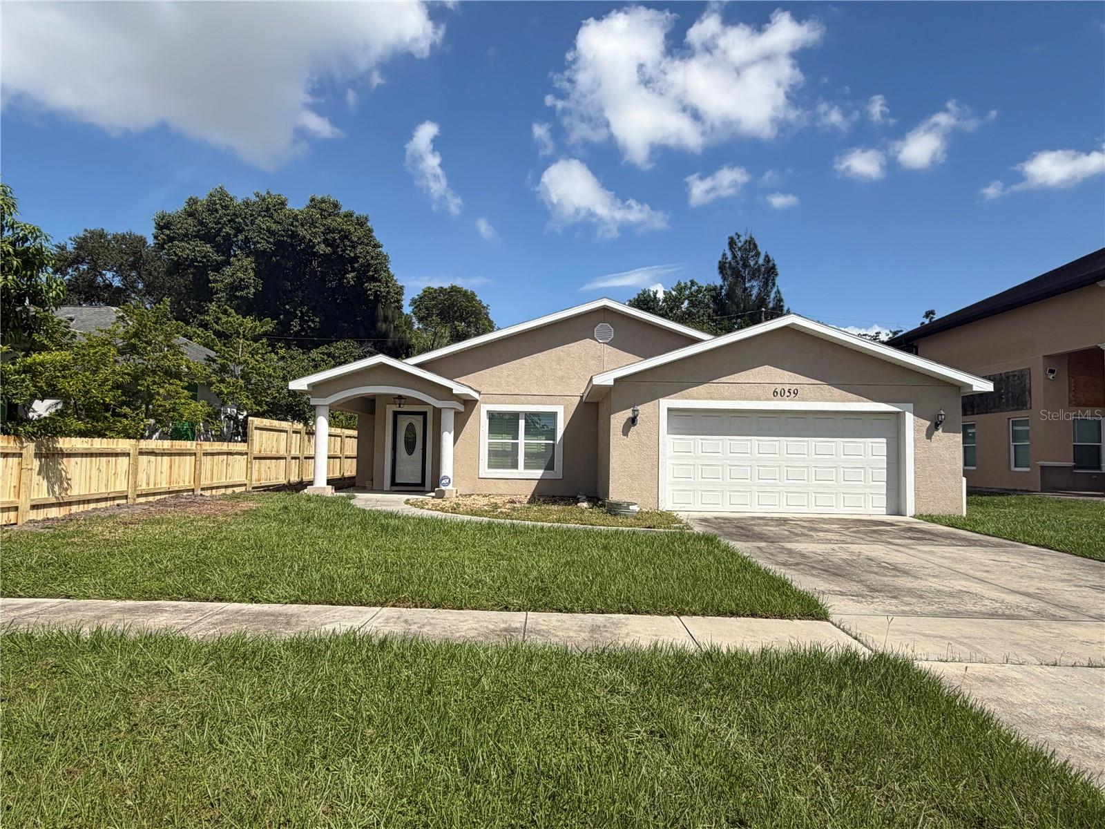 Welcome to a move-in-ready, three-bedroom, two-bathroom home located in the heart of Pinellas Park, situated outside of a flood zone. This property features an open layout ideal for entertaining. Double French doors lead into the living and dining rooms, both complete with engineered wood flooring. The kitchen is equipped with stone countertops, stainless steel appliances, a microwave hood fan, and solid wood cabinets. Additionally, a spacious family room with tray ceilings offers ample space for gatherings. The primary bedroom includes an en-suite bathroom featuring a double-sink vanity, a walk-in shower, and a private toilet room. It also offers a walk-in closet with a built-in organizer, as well as double doors providing direct access to the backyard. The exterior includes a fully fenced backyard with a covered, screened paver porch and an above-ground spa. The property is conveniently located just minutes from shopping, dining, and major highway access.