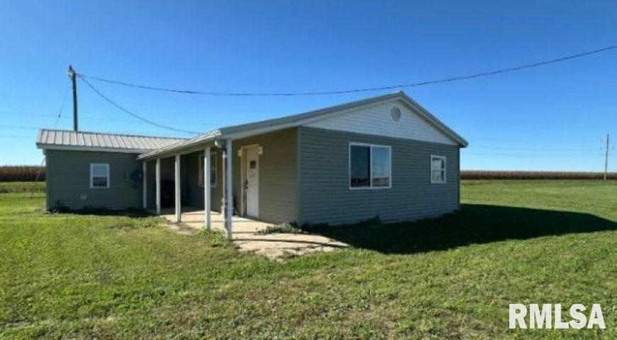 Affordable 2-bedroom home offering a unique opportunity to choose the option that works best for you! The current owner has already completed extensive updating and remodeling, with only a few finishing touches remaining, including flooring and other miscellaneous items. Buyer may purchase the property in its current condition at a reduced price and complete the remaining improvements themselves, OR seller is willing to complete the agreed-upon remaining work at the listed price prior to closing. A standout feature is the 12' x 31' outbuilding with concrete floor, impressive 12' ceilings and 100-amp electrical service to the building—ideal for a workshop, storage, hobbies or additional workspace. The home is situated on a slab with an efficient, easy-to-maintain floor plan. A great opportunity for a buyer looking to save by finishing the home to their own taste or enjoy the convenience of having the remaining work completed before move-in. Ask your agent for details regarding current-condition pricing and seller completion options.