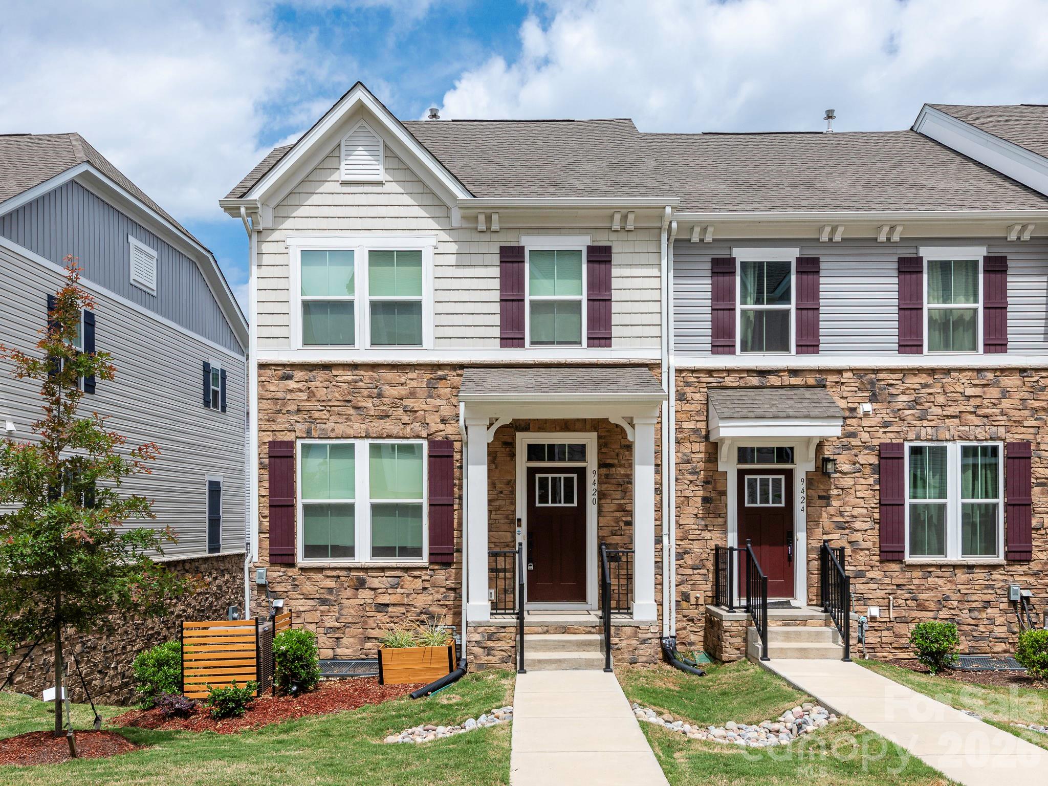 Don't miss out on this beautifully maintained and upgraded end-unit townhome in the Mallard Creek Towns community of Charlotte, NC. Located in the heart of University City, this 3-story Mozart floor plan offers the space, finishes, and walkability that professionals and relocators are searching for in 28262.Main LevelThe open-concept kitchen and living area features luxury vinyl plank flooring, a gas range, stainless steel appliance package, pendant lighting over the island, under-cabinet lighting, and a single-bowl kitchen sink with upgraded faucet. Step out to the private cantilevered deck off the kitchen — perfect for morning coffee or evening grilling. A first-floor powder room and direct entry from the rear-load two-car garage complete the main level.Upper LevelThe owner's suite is a true retreat with tray ceiling, ceramic surround shower, framed glass shower door, and walk-in closet. Two additional bedrooms, a second full bathroom, and a conveniently located upstairs laundry round out the second floor. 9-foot ceilings throughout add to the open feel.Lower LevelThe finished walk-out basement includes a recreation room and powder room — ideal as a home office, media room, gym, or guest space.Smart & EfficientThis home is equipped with a WiFi-enabled smart thermostat, WiFi garage door opener, smart locks, Ring doorbell, tankless natural gas water heater, LED light packages, and TV pre-wire with 4K HDMI and ethernet. Custom paint and tasteful accent walls add personality without the work.LocationJust minutes from UNC Charlotte, University Research Park, Atrium Health University City, I-485, I-85, Concord Mills, and the LYNX Blue Line. This is one of Charlotte's most convenient locations for commuters, healthcare professionals, students, and anyone working in the University City or Concord business corridors.If you've been searching for a move-in ready townhome in University City Charlotte with a finished basement and end-unit privacy, this one checks every box. Schedule your showing today.
