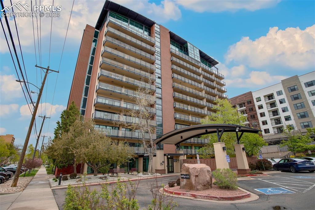 Check out this modern Downtown condo with stunning views and exceptional amenities! Located just steps from the heart of Downtown Colorado Springs, this stylish high-rise condo in CityWalk Downtown Lofts offers the ideal combination of urban convenience, scenic beauty, and low-maintenance living. You’ll love being within walking distance of eateries, shopping, Colorado College, parks, and more! Inside, the unit is flooded with natural light thanks to floor-to-ceiling windows that span the entire length of the space. The open-concept design seamlessly connects the Living Room, Dining Area, and Kitchen, creating a welcoming and spacious environment perfect for both daily living and entertaining. Two separate walk-outs lead to a large patio with breathtaking eastern views—perfect for relaxing anytime of day or evening. The generously sized primary Bedroom includes an en-suite bathroom, a walk-in closet, In-Unit Laundry, and its own walk-out access to the patio for added convenience! The building itself offers secure access throughout, a gated parking lot for residents, and a main-floor mail station. Additional amenities include a fitness center, sauna, multiple outdoor patio spaces, a recreation area, and a large welcoming lobby! The HOA covers all utilities, including heat, water, electricity, along with insurance making for truly hassle-free living. Don't delay--take a look at the linked tours and schedule a showing today!