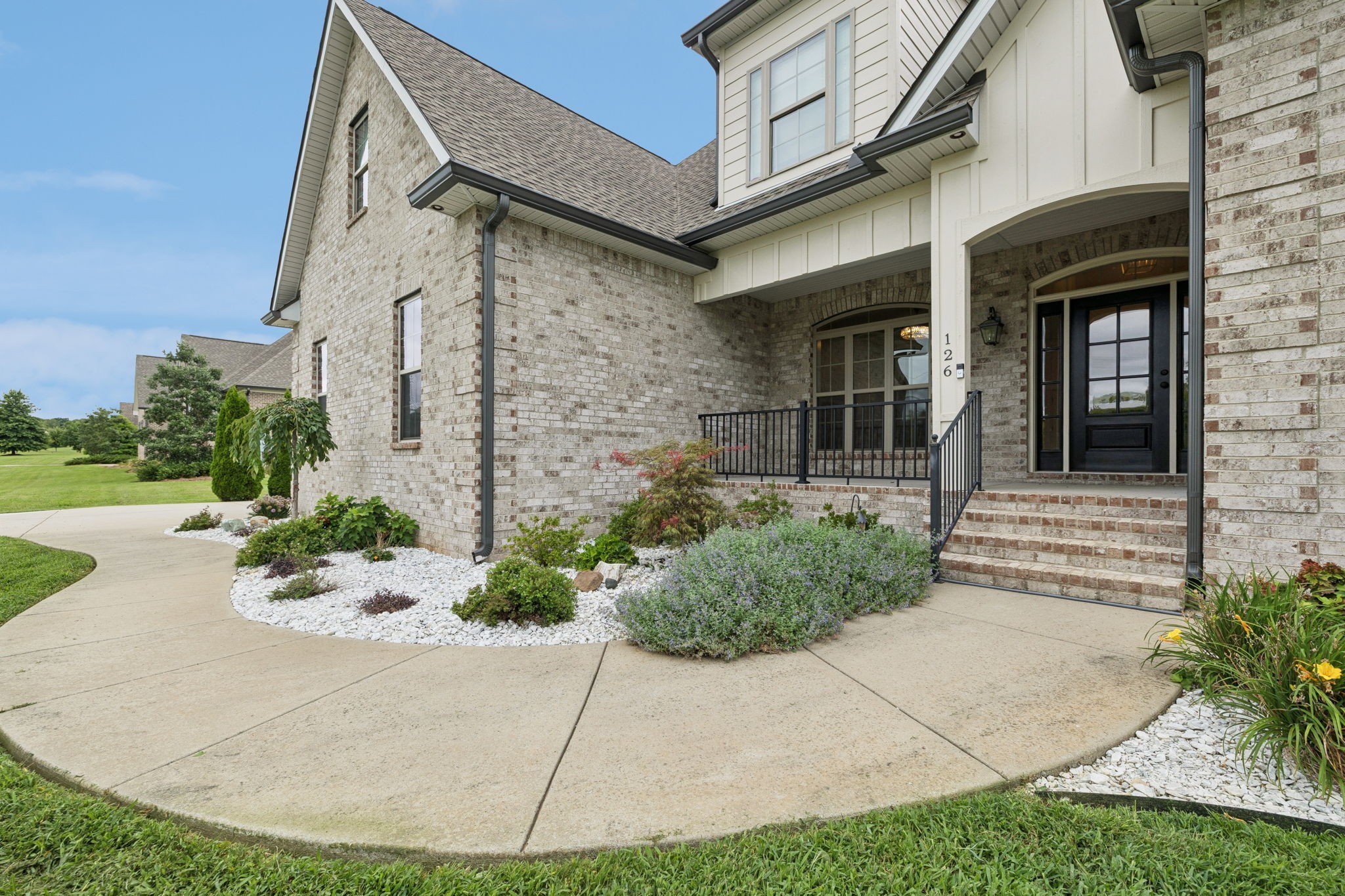 Welcome to this light-filled, custom-built luxury home in the highly sought-after Covington neighborhood, just over a mile from I-24. Nestled among the rolling hills of Beechgrove, this exceptional residence offers generous living space, refined craftsmanship, and an impressive outdoor entertaining retreat. Savor morning coffee or evening dinners on the expansive back deck, accompanied by the tranquil sounds of the creek bordering the rear of the property. Unwind on the inviting front porch as you take in breathtaking sunset views over the surrounding hills. Inside, the home showcases elegant architectural details, including rounded corners, soaring ceilings, extensive millwork, judges paneling, and premium lighting and ceiling fans throughout. The thoughtfully designed kitchen features built-in appliances and seamless functionality, ideal for both everyday living and entertaining. Situated on a beautifully landscaped lot, the fully fenced backyard is an entertainer&rsquo;s dream&mdash;complete with attractive vinyl fencing, expansive stone slab patios, a hot tub, and a built-in bar, creating the perfect setting for relaxation or hosting guests. The upper level offers three additional versatile rooms plus a hobby or storage space, providing exceptional flexibility to suit a variety of lifestyle needs.