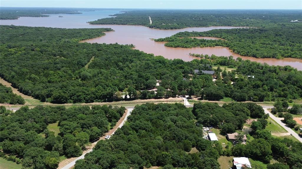 2.62 acres available near Lake Thunderbird.  This wooded property could be the perfect place for your new home!  It sits on a paved road and has potential to be a very private place to build your dream home.