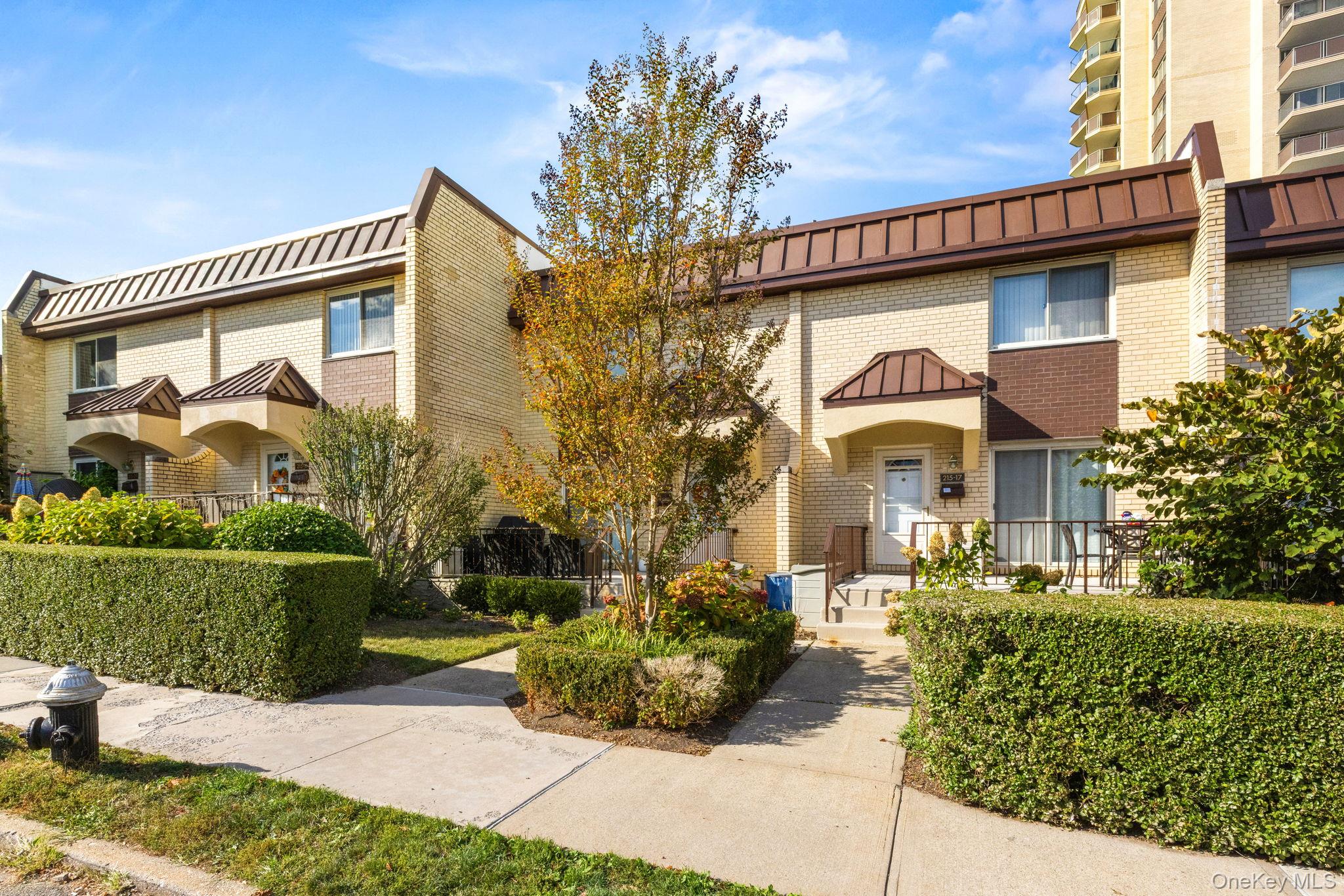 Introducing a beautifully-appointed townhouse in the distinguished Towers at Water’s Edge community at 215-15 23rd Ave, nestled in the heart of coveted Bay Terrace, Bayside. This townhouse features 3 spacious bedrooms and 2.5 baths across approximately 1,800 sq ft of living space. Recently upgraded eat-in kitchen with stainless steel appliances, ready for both casual breakfasts and entertaining.. Towers at Water's Edge features plenty of Full-service community amenities: fitness centre, pool, tennis courts, café and more — a resort-style lifestyle right at home. Maintenance includes gas, electricity, heat, central AC, RE taxes, and water. Situated in Bay Terrace, you are just a stroll away from schools, shops, and transit. The local elementary and middle schools offer strong ratings, and the vibrant Bay Terrace Shopping Center is close by. Commuting is a breeze: express buses and the LIRR nearby provide efficient access into Manhattan. The leafy, family-friendly neighborhood is a true gem of Northeastern Queens.