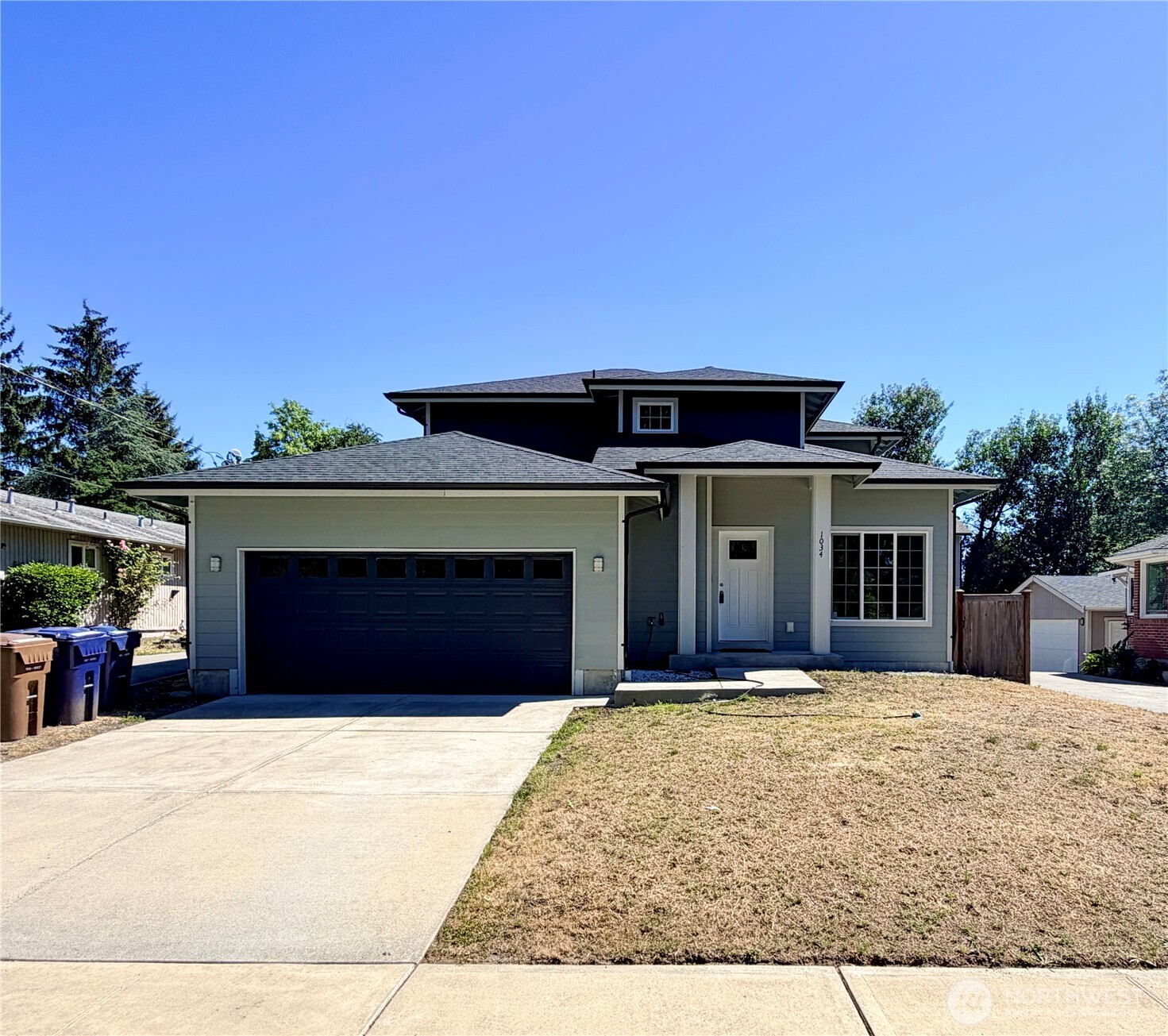 Come see this nicely designed home. 4 bedrooms and 2.5 baths. Bright open floor plan. Primary bedroom on the main floor. Vaulted ceilings, gas fireplace, A/C, stainless steel appliances, granite counters in kitchen & baths, gas BBQ hookup, huge covered patio and completely fenced backyard. Close to HWY-512, parks, schools, shopping, restaurants, bases and entertainment.