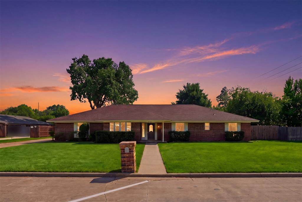 This well-maintained home offers both functional living spaces and recent updates throughout. The living room features a wood burning fireplace, while the kitchen is equipped with stainless steel appliances and decorative backsplash detail.  The primary bathroom includes dual vanities for added convenience. Outside, the fenced backyard provides a private outdoor space with a covered patio suitable for dining and relaxation. Recent improvements include fresh interior and exterior paint along with new flooring installed throughout the residence. These updates contribute to the home's move-in ready condition. A 100-Day Home Warranty is included with purchase.