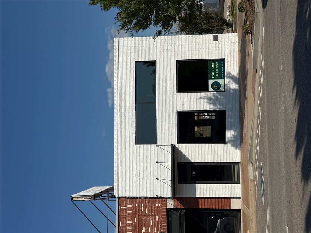 Positioned at one of the most sought-after corners in Downtown Edmond, this 3,626 sq. ft. property commands exceptional visibility and presence. As the first building you see when entering Downtown Edmond, it offers unmatched exposure for retailers, restaurants, or professional office users seeking prominence in one of the metro’s most vibrant districts.

Property Features
Frontage on Three Sides: Highly visible with sidewalk presence and expansive windows along 2nd Street and Broadway.
130 feet of 20-foot-tall wall frontage, ideal for signage, branding, and architectural impact.
Rear entrance off a well-traveled alley, providing easy access for deliveries, staff, or additional customer flow.
Delivered as a White Box: Includes new mechanical systems, ADA-compliant restroom, and basic electrical service—ready for tenant customization and finish-out.

Location Highlights
This property sits in the heart of Downtown Edmond, a district that has undergone a remarkable revitalization and continues to be one of the most desirable destinations in the Oklahoma City metro area.
Vibrant Downtown Core: Home to more than 40 locally owned restaurants, boutiques, art galleries, and coffee shops.
Walkable District: Pedestrian-friendly streetscapes, public art installations, and weekly events such as the Edmond Farmers Market and Heard on Hurd draw thousands of visitors each month.
Strong Demographics: Edmond consistently ranks among the top 10 safest cities in Oklahoma and boasts some of the highest household incomes and education levels in the state.

Opportunity
This location offers a rare opportunity to secure the most visible retail or restaurant site in Downtown Edmond, perfectly suited for a flagship concept, boutique retail, caf&#233;, or creative professional office. The combination of corner prominence, walkable traffic, and modern infrastructure makes this one of the premier lease opportunities in the Edmond market.