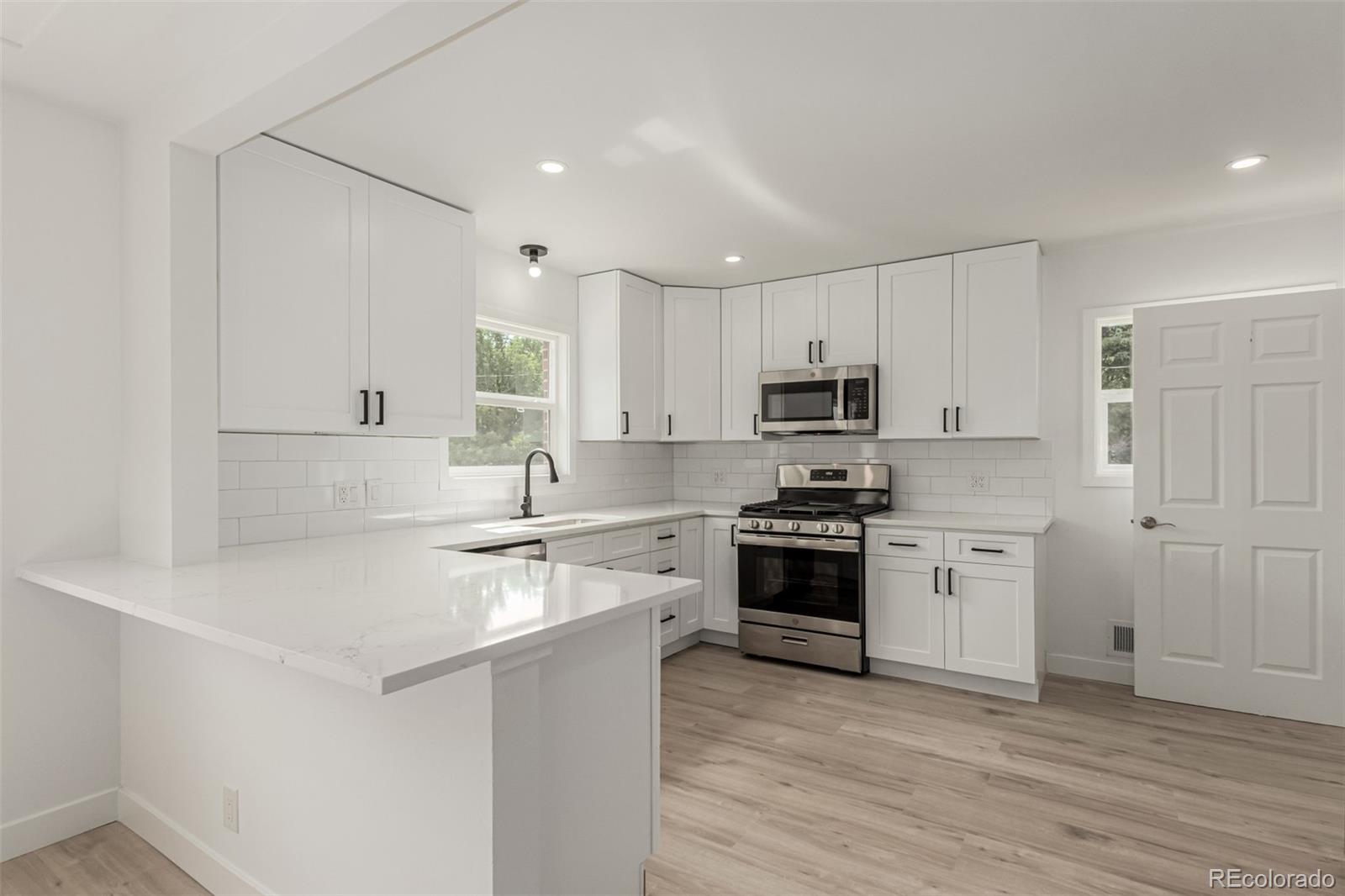 Welcome to this beautifully renovated ranch-style home with a finished basement! Great location in a quiet, well-established neighborhood with easy access to I-25 & I-36. Every detail in this home is NEW!!!—roof, HVAC/AC system, subpanel, kitchen, bathrooms, doors, trim, flooring, paint, electrical, & plumbing fixtures. A bright & inviting living/dining room space sets the tone for warm gatherings & everyday living. The open-concept kitchen showcases brand-new stainless steel appliances, quartz countertops, & sleek cabinetry. The main level features 2 bedrooms, including a rare primary suite with a walk-in closet & a private, fully remodeled bathroom. All bedrooms are carpeted with soft, plush flooring for extra comfort! Downstairs, you'll find 3 additional bedrooms, a full bathroom, a cozy family room ideal for a game or media area, & an unfinished utility room offering extra storage or future expansion potential. Enjoy the outdoors with a fully refreshed front yard, a grassy backyard with a covered patio perfect for relaxing, & a handy storage shed. A detached 2-car garage adds convenience & functionality! Located near parks, lakes, & trails, this home offers a rare combination of upgraded features & desirable location. Don't miss your chance to own a like-new home in an established neighborhood!