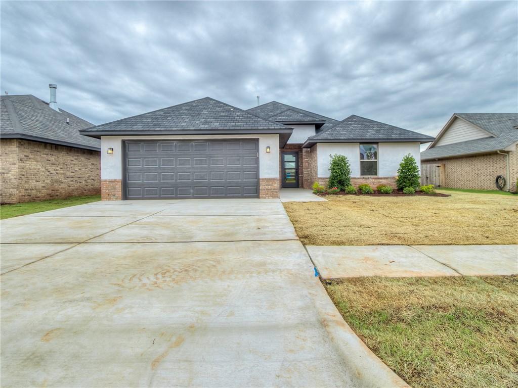 This beautifully designed home in the desirable gated Princeton Parke neighborhood has everything you need! It's located in the sought-after Deer Creek School District and just minutes from shopping, dining, and everyday conveniences. This thoughtfully planned 4-bedroom residence offers comfort and functionality throughout. Two secondary bedrooms are situated at the front of the home and share a full bathroom with dual sinks, ideal for family or guests. A third bedroom is located on the opposite side of the home, providing excellent flexibility. As you continue through the home, you'll enter the open-concept living area featuring wood-look tile flooring and a cozy wood-burning fireplace, perfect for everyday living and entertaining. The kitchen includes a central island, a walk-in pantry, and flows into the dining area with access to a covered back patio. The spacious primary suite is located at the back of the home and offers double vanities, a soaking tub, a separate shower, and a walk-in closet. A convenient utility room is located just off the garage entry. Schedule your showings before this gem is gone!