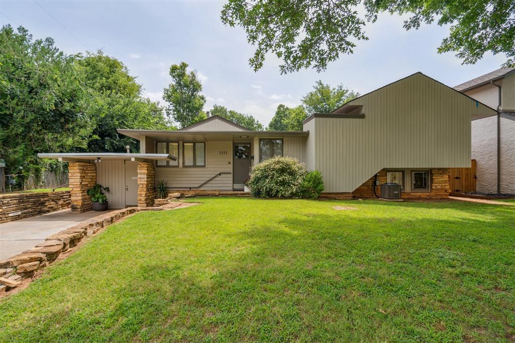 Rare opportunity to buy the Mid-Century home Henry L. Kamphoefner designed for himself while serving as the Chairman of the School of Architecture at the University of Oklahoma. Located just a few blocks from the OU campus, this house combines redwood, flagstone, and plenty of windows in an L-shaped design. 
“Careful thought was given to the sun’s habits in this region, and roof overhangs were designed to keep it under advantageous control.”  One entire wall of the living room is made up of floor-to ceiling windows.  There is a gorgeous stone fireplace with two openings, one faces the office area and the other faces the living room.  There is a unique wood block divider as you enter the home.  “The story that has passed from one owner to the next is that the dividers like this are a Kamphoefner trademark.  The three columns on this one indicate the three stories of the home – the basement level study, the main floor, and the upper level bedroom. “  When Frank Lloyd Wright visited Norman in 1946, he actually stayed in one of these bedrooms!  Quoted statements are from an article published by Lynne Rostochil in Mod Blog. Seller is a licensed Realtor in the State of Oklahoma.  Although the property condition disclosures have been completed, the Sellers have never lived at the property. Title work is started at First American Title Company.