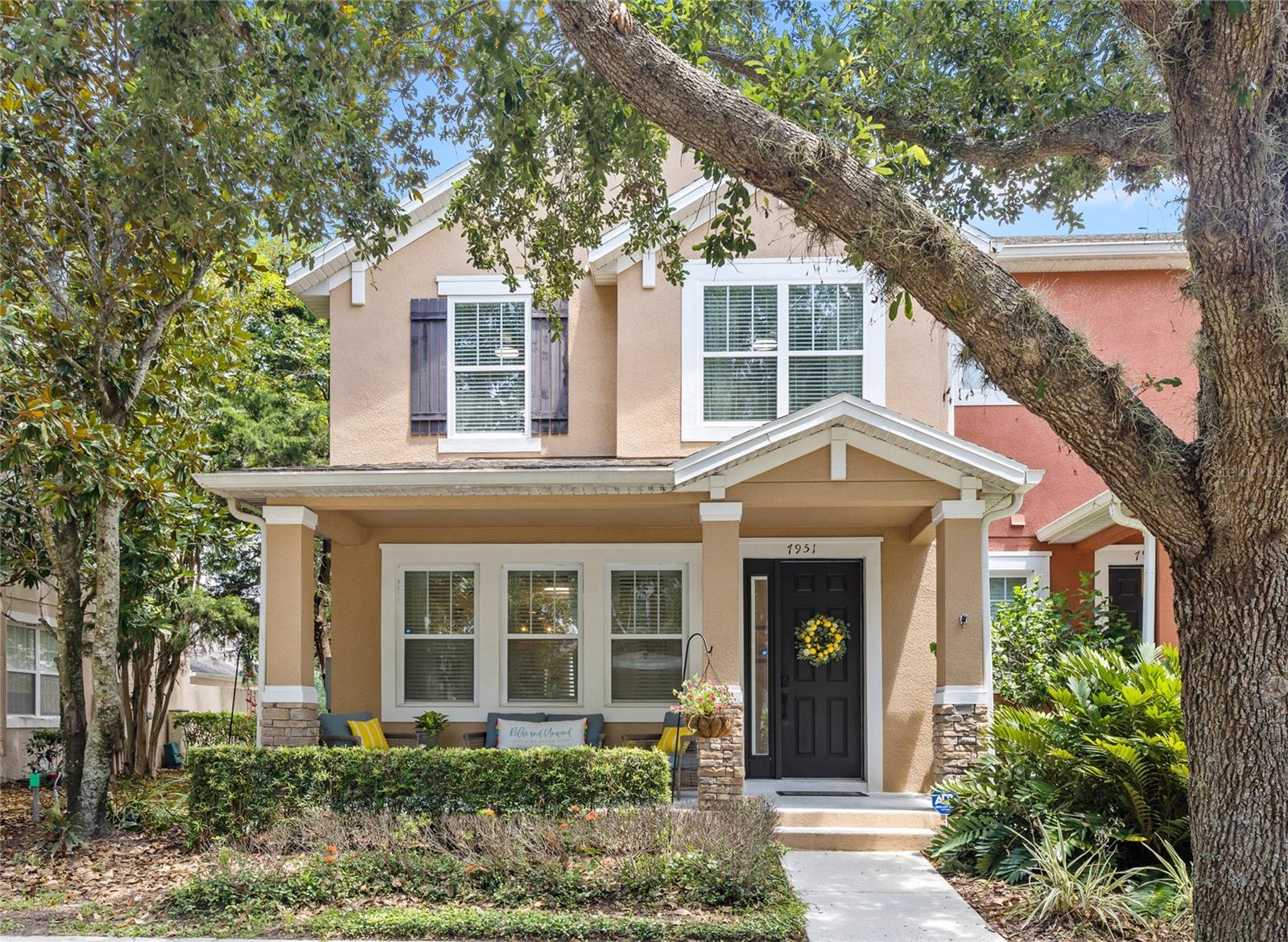 Welcome to a premier opportunity in the highly desirable Lake Nona community. Under the canopy of mature trees, this beautifully maintained 4-bedroom, 3-bathroom end-unit townhome is located in Water’s Edge – a gated, golf-cart friendly alcove in the Northlake Park subdivision – and offers unmatched privacy, outdoor space, and curb appeal that discerning buyers know to look for. With 1,595 square feet of thoughtfully designed living space, this home strikes the perfect balance between functionality and aesthetic. Sunlight pours in, highlighting the central dining configuration that is equally suited for quiet evenings or effortless entertaining. The living room anchors the main floor, offering a seamless flow between the kitchen and the second level. On the first floor, you'll find a guest bedroom and full bathroom, making every day living and functionality hassle-free. Upstairs, the primary bedroom and two spacious guest bedrooms offer a true retreat for family, friends, or for flexible use for an office, craft room, and more. Newer appliances and core components provide peace of mind, including a newer water heater and HVAC, and brand new stainless steel kitchen appliances. Step outside and the corner lot truly outshines the rest - a back courtyard with room to entertain and play, a large front porch, and a short walk to the community amenities which include a pool, playground, basketball court, tennis/pickleball court, dog park, walking trails, and a private community boat dock on to Lake Nona. HOA dues also cover up to 2 gigs of high-speed WIFI, a household membership to the 30,000 square-foot Lake Nona YMCA - located within walking distance from the community - which offers free weights, cardio equipment, outdoor heated swimming pools, and drop-in childcare. Throughout the community, you’ll enjoy shaded sidewalks and pocket parks, all within easy reach of A-rated schools, major employment corridors, the Orlando International Airport, and everything that Orlando has to offer. This is the kind of opportunity that doesn't come along often. Contact us to schedule your private tour today!