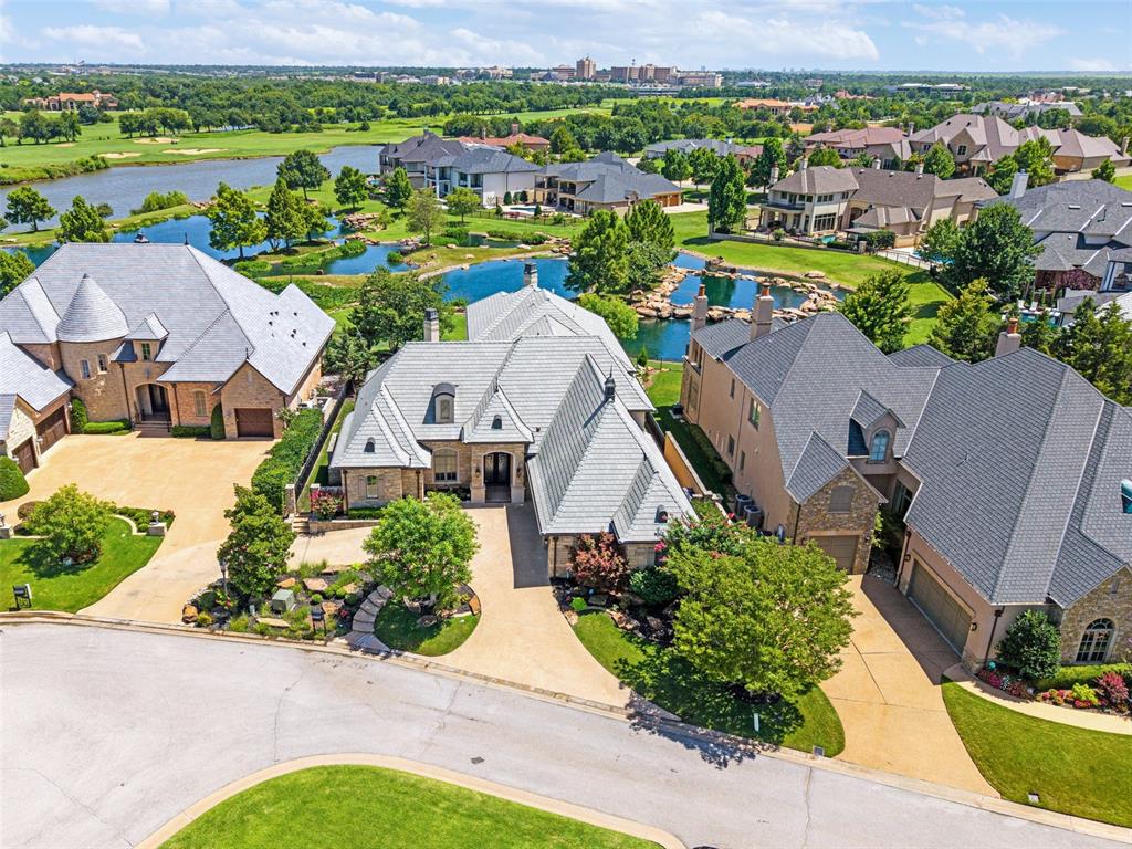 SEALED BID AUCTION!! BRING ALL OFFERS BEFORE NOVEMBER 14th!! SELLER WILL PAY $10K IN CLOSING COSTS! POSSIBLE OWNER FINANCING! Luxury Living with Waterfall Views in Gaillardia Welcome to 15012 Gaillardia Lane, a one-of-a-kind 5-bedroom, 5.5-bath estate in the heart of Oklahoma City’s most prestigious gated golf community. Recently remodeled and immaculately maintained, this stunning home offers over 5,000 sq ft of high-end living, designed for comfort, security, and effortless entertaining—all with breathtaking views of serene ponds and cascading waterfalls. From the moment you arrive, you’ll appreciate the thoughtful upgrades and rare amenities, including a 3-car garage, central vacuum, two fireplaces, and a large balcony that makes the most of Gaillardia’s scenic landscape. Inside, the open floor plan features a chef’s kitchen, expansive living spaces, a large game room, and a private theater room—perfect for family fun or hosting guests. The luxurious primary suite includes a spa-inspired bath, oversized custom closet, and a discreet storm shelter with built-in safe for peace of mind. Standout Features: • 5 spacious bedrooms | 5.5 bathrooms • 3-car garage with attic winch for lifting heavy storage directly from the garage • Massive, built-out attic space (not included in square footage) • Two fireplaces, central vacuum system, and premium finishes throughout • Large game room and private theater room • Storm shelter and safe built into the master closet • Expansive balcony with stunning views of ponds and waterfalls • Located in the elite Gaillardia Golf Community and top-rated Deer Creek School District Flexible Purchase Options: • Owner financing available • Trades welcome—upgrade your home now! • Seller will pay $10,000 in closing costs with a full-price offer This is a rare opportunity to own a truly special home with unmatched views in one of Oklahoma City's finest communities. Schedule your private tour today.