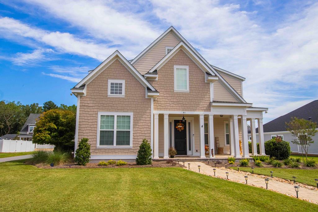 This 5 bedroom/4 bath home is stuffed with amenities: wood floors downstairs & on stairwell, an amazing kitchen with gas stove cooktop, chef's pantry, adjoining great room with vaulted ceiling and fireplace, newly painted, primary suite with new carpet, double vanity, tiled shower, soaker tub as well as large walk-in closet. The upstairs layout is perfect with a bonus room along with additional insulation to curb the power bill.  2 upgraded high efficiency AC units & a smart thermostat that you can program from your phone.  Oversized garage has ample room for 2 vehicles & a golf cart. The  fenced in yard is private & just waiting for the kids & your pets to enjoy!  Life & living in Madison Grove couldn't get any easier! Pool, gym & clubhouse is available. Convenience is everything! Call today for your appointment!