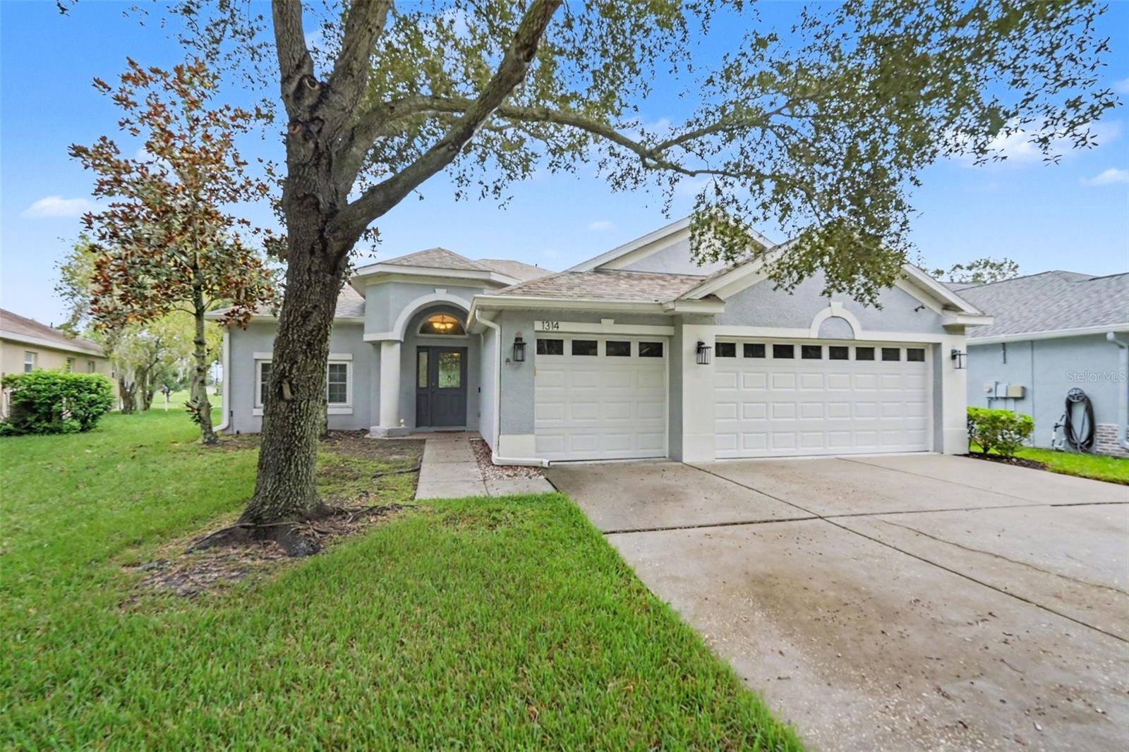 Located in the gated Diamond Hill golf community in Valrico, Florida, this 4-bedroom, 3 full bath home features a 3 car garage, 2,243 square feet of living space, and significant system updates. Major improvements include a 2025 water 2022 A/C, 2019 roof, two impact resistance windows, and a new garage door opener. Situated on a golf course lot with no rear neighbors, the property enjoys private, scenic views of the surrounding fairway.Inside, high ceilings and natural light enhance a split-bedroom layout designed for comfortable living. The home features a formal dining area near the entrance alongside a versatile flex space suitable for a home office or sitting area. Wood flooring extends through most of the main areas, with soft carpet in two of the bedrooms.The heart of the home is the updated kitchen, which offers granite countertops, a custom backsplash, newer stainless steel appliances, lower cabinets with pull-out drawers, and a pantry with custom shelving. The kitchen opens directly to the main living area for seamless interaction.The primary bedroom includes a walk in closet with a custom organizer system. A large enclosed lanai with windows provides additional year-round living space overlooking the spacious backyard and peaceful golf course setting.Diamond Hill residents enjoy low HOA and CDD fees along with gated amenities including a community swimming pool, clubhouse, fitness center, playground, and basketball court. Enjoy this strategic location near Highway 60, I-75, and the Selmon Expressway, as well as shopping and dining, and 40 minutes from MacDill Air Force Base, Tampa International Airport. Book your showing today!