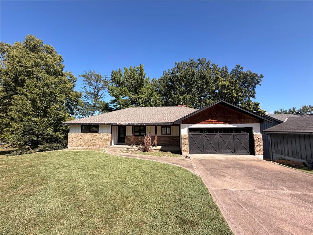 Incredible opportunity on a large corner double lakefront lot in Lake Winnebago! This home has been completely gutted and is ready for a new vision and new life. With no finished square footage, the interior is a true blank canvas—giving the next owner the opportunity to create a custom lake home designed exactly the way they want it.The property sits along a quiet cove and features a covered deck overlooking the water, providing a great starting point for creating the perfect lakefront retreat. Even better, a dock easement comes with the property, giving the new owner the opportunity to install a private dock and enjoy direct access to the lake right from home. A newer roof was installed approximately five years ago, and the suspended garage provides excellent additional storage below, complete with a garage door accessible from the walkout basement side.Enjoy everything the Lake Winnebago lifestyle has to offer! Take advantage of the community’s outstanding amenities, including the nearby park, Arrowhead Yacht Club, and the brand-new resort-style pool. Spend your days boating and enjoying the lake, your evenings at the Yacht Club, or simply relaxing poolside—all just moments from home.Whether you’re looking to renovate, redesign, or completely reimagine, this is a rare chance to create something special on an exceptional double lakefront lot. Bring your plans, your builder, and your vision!