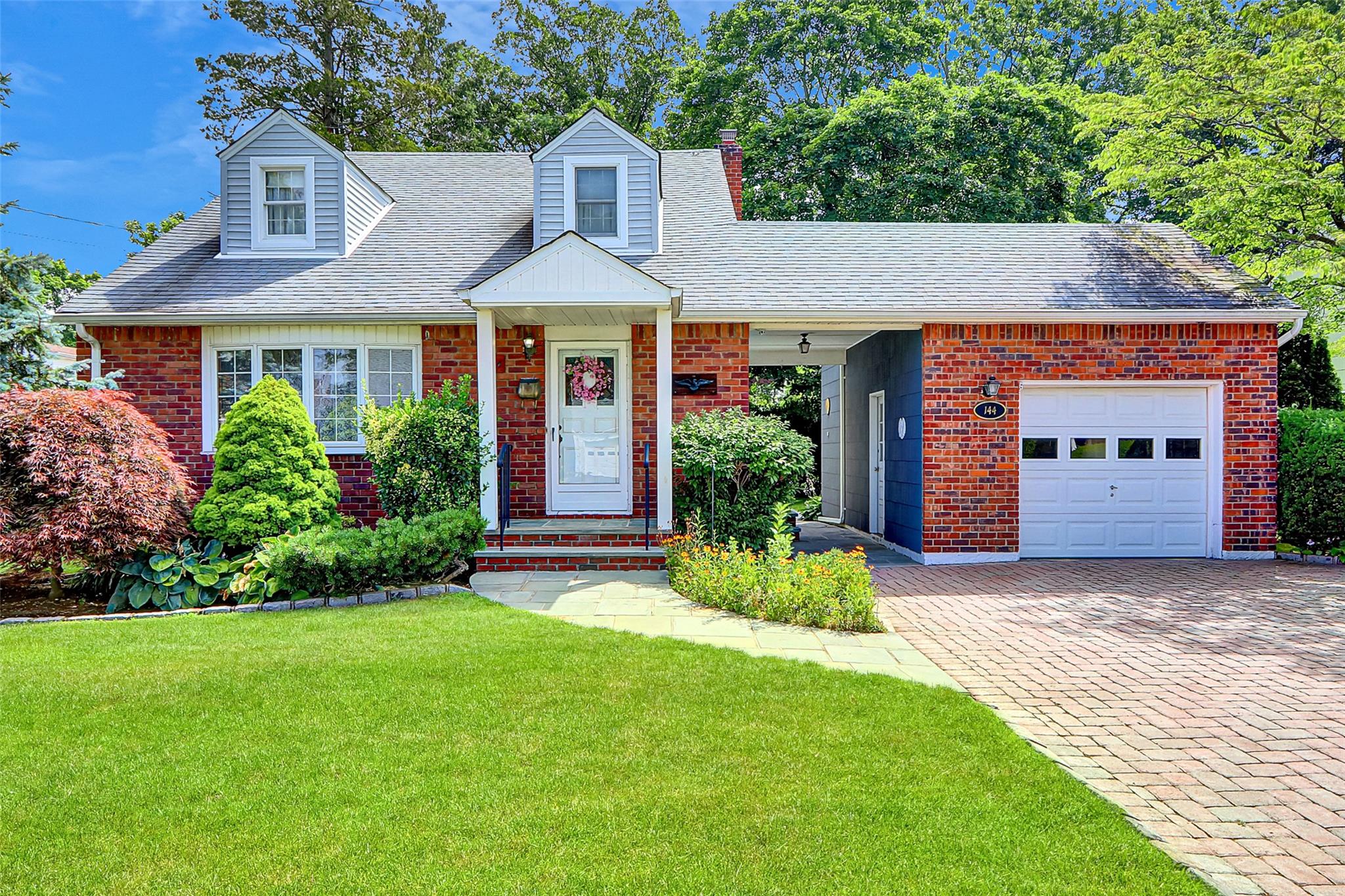 Set your furniture down in this 5 bedroom 2 bath home in award- winning Bethpage School District 21 and begin to take advantage of all that the Bethpage community has to offer.  Close to Bethpage downtown, LIRR, Bethpage Community Park, golf course, schools, highways, beaches and so much more!  This home has been meticiously maintained featuring beautiful breezeway and private tree-lined yard.  Make this your forever home!