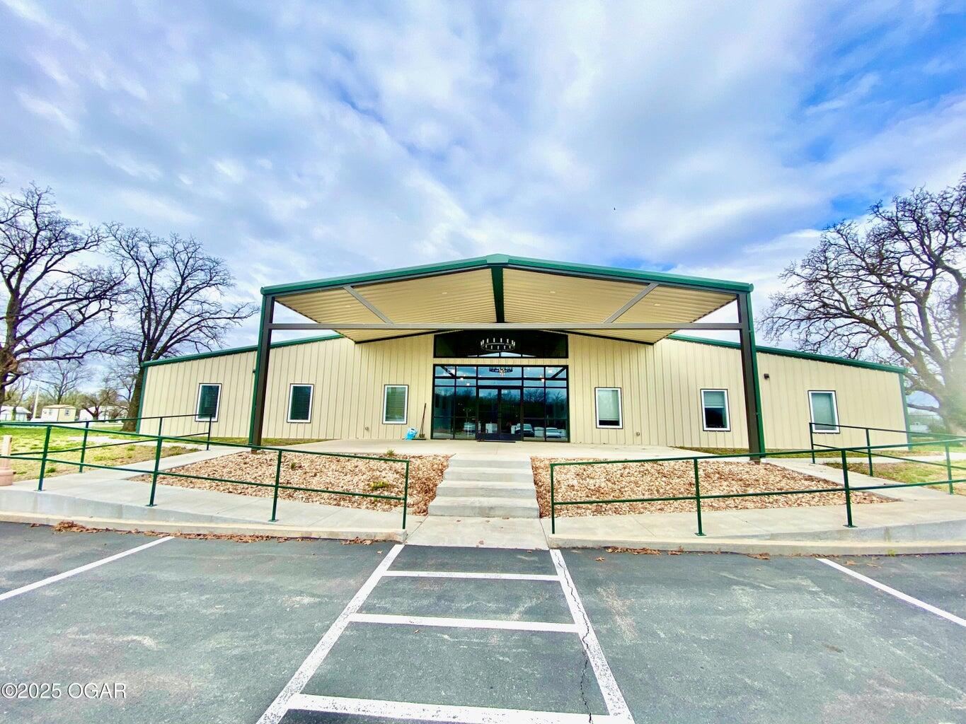WAREHOUSE/ TRUCKING/ INDUSTRIAL-OFFICE in Joplin/ Duenweg/ Carthage Industrial ''Triangle'' developing area. On access to I-44 less than 1 mile (2200 feet) . Close proximity to Prigmore Exit and Joplin's Southward Industrial Park. This almost 24k sq ft recently renovated and expanded Class S-Light industrial Site and Professional Office space, with additional land to expand operations. 4- 16 x 16 Overhead doors-with 2 pass throughs, 1-14 x 14 Overhead doors, 1 Bed Apartment, 8 x 12 Concrete shelter, Over 11k sq ft Professional office spaces and 2200+ Unfinished additional office space available.****34+/- acres available to develop further.