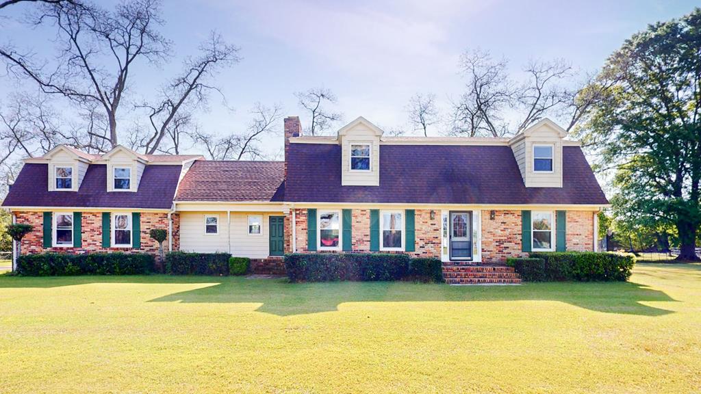 Welcome to 3136 Hwy 188 N, Cairo, GA, a stunning example of Southern charm and spacious living. This beautiful brick home boasts 3,293 sqft of living space, offering 4 bedrooms and 3 full bathrooms. The interior showcases a mix of parquet wood, tile, and carpet flooring, enhancing the warmth and character of the home. With tons of storage throughout, you'll have room for everything you need. Set on a sprawling 4.29 acres of land, this property features majestic pecan trees and plenty of space for outdoor activities. Some of the land is already fenced, perfect for adding horses, cows, or your favorite animals. One of the bedrooms offers a private entrance, making it an ideal in-law suite or potential rental income space. Natural light pours into every room, creating a bright and welcoming atmosphere. The home also offers beautiful views from every window, all of which have been updated for energy efficiency. The kitchen is open to the main living area, which is highlighted by a cozy wood-burning fireplace. There's also a second living room area that can be used as a den, game room, or whatever suits your lifestyle. With endless possibilities, this property is truly a gem. Contact us today to schedule a private tour and see everything this home has to offer!