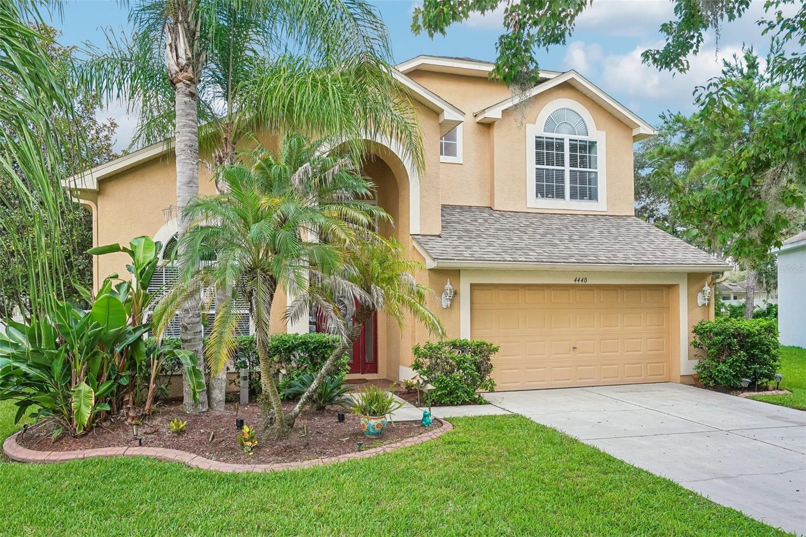 From the moment you arrive, this beautifully maintained Hamilton Park home makes a wonderful first impression. Set on an oversized premium conservation lot, the home enjoys a peaceful, private setting with a large fenced backyard and no rear neighbors. A beautiful leaded-glass front door with matching sidelight welcomes you inside, where a light and bright interior, neutral color palette, vaulted ceiling, and open floor plan create a warm and inviting atmosphere.The main living spaces are designed to offer both elegance and everyday comfort. Wood floors flow throughout the main level, connecting the formal living and dining rooms with the heart of the home—the spacious kitchen. Here, a large island with breakfast bar creates a natural gathering place, complemented by 42-inch cabinetry, rich granite countertops and backsplash, newer appliances, and generous recessed lighting. The open layout makes it easy to stay connected whether you're enjoying a quiet evening at home or hosting family and friends.The primary suite offers a relaxing retreat of its own, with sliding glass doors that open directly to the screened lanai and bring the beauty of the conservation setting into the space. The en suite bathroom features dual rectangular sinks, a glass-enclosed walk-in shower, and a separate garden tub. Upstairs, the loft provides flexible additional space that can easily adapt to your needs as a home office, media area, playroom, or cozy sitting space.And then there's the backyard—where this home truly shines. Step through to the screened lanai and you'll find an inviting outdoor living space overlooking the oversized yard and conservation area. The heated saltwater pool is perfect for cooling off, relaxing, or gathering with friends, while the separate above-ground spa provides another place to unwind. With plenty of room in the fenced backyard, there's space to enjoy the outdoors in privacy and make the most of Florida living.You'll also appreciate the peace of mind that comes with several important recent updates, including a roof approximately 2.5 years old, HVAC approximately 1 year old, water softener approximately 1.5 years old, newer appliances, and a newer pool pump.Beyond the property itself, Hamilton Park offers a wonderful neighborhood setting with community playground and picnic pavilion, creating an inviting place for residents to gather, play, and enjoy the outdoors.Beautifully cared for and thoughtfully updated, this home combines a private conservation setting, comfortable living spaces, and exceptional outdoor living in one of Wesley Chapel's desirable communities. It's a home that feels welcoming from the moment you walk in—and even better once you step outside.