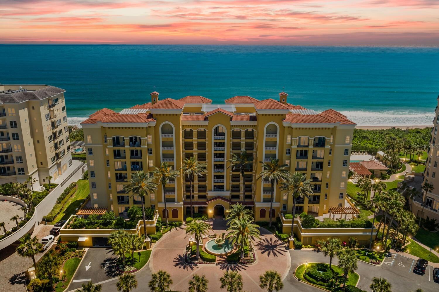 "UNIQUE OPPORTUNITY!   Rarely available totally renovated ocean front 2 bedroom condominium for immediate occupancy without the hassle and expense of contractors and subs.  Decorate and furnish the way you desire and then move right in to begin enjoying beachfront living.   ”EXTRAORDINARY residential opportunity for the discriminating buyer. The elegant and refined total renovation of the residence was completed in 2024 with over $400,000 in upgrades. This second-floor location provides a vista of manicured lawns, gardens, swaying palm trees and a spectacular ocean view. All cabinetry throughout features the custom cabinetmaker Greenfield’s special blend of old-world attention to detail combined with the application of their modern technical expertise. Stunning tailor-made library with unique internal storage. Vesta Fine Hardware captures the essence of European design, quality craftsmanship and personalized style. The bright and functional kitchen features appliances that have been selected for a lifetime of performance, unrivaled control, precision, style & substance. Included are a Wolf Oven, Wolf induction Cooktop, Cove Dishwasher and Monogram Built-in refrigerator with custom Greenfield paneling. Living room features Dimplex electric fireplace with Wilwoodman surround. Beautiful Spanish Porcelain flooring has been laid throughout the complete home for continuity of appearance. Designer closets take full advantage of their space for ease of use and function. Brizo and DXV Hardware are found throughout with high-end Kohler fixtures selected for their quality and function. The master bathroom shines in Italian marble with a fresh design that includes a wonderful dressing table and soaking tub. The LG Washer & Dryer is elevated on Pedestals for ease of use. The Trane HVAC System comes with a new 10-year warranty along with the latest in hot water heating and recirculating system. Electrical and lighting is all new. “Aura” paint, the highest quality by Benjamin Moore, is found throughout. All rooms have Powerview window treatments by Hunter Douglas including added blackout shades in bedrooms. This residence is available for immediate occupancy for the most discerning of buyers.