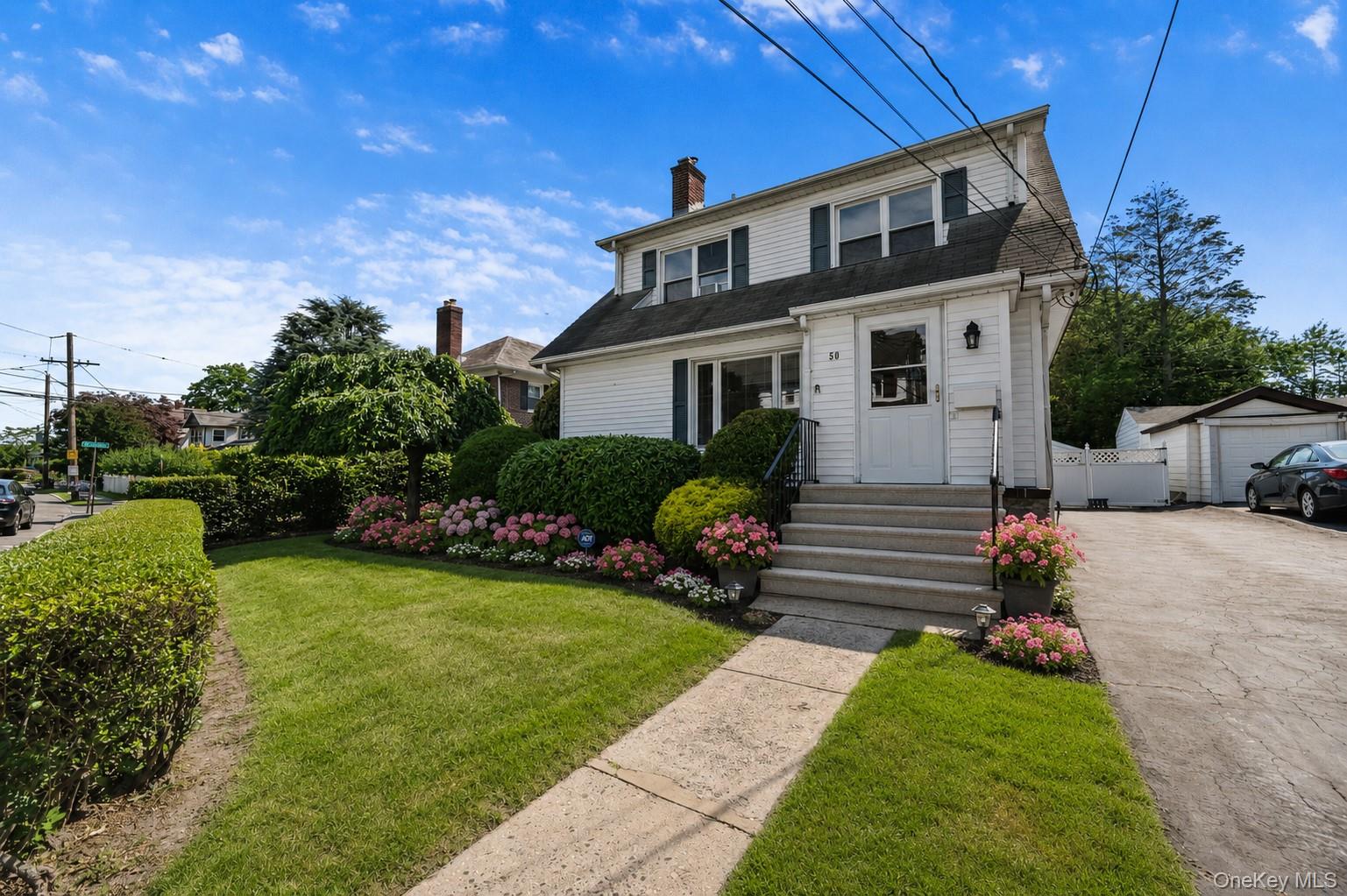 Welcome home to the highly sought-after Stephenson Park neighborhood in New Rochelle's desirable East End! This charming Colonial offers the perfect combination of space, convenience, and outdoor entertaining.  Featuring 4 bedrooms, 2 full baths and 1 half bath, this well-maintained home boasts over 2100 square feet of living space.  There is approximately 1,300 square feet on the first floor alone, providing generous living space for today's lifestyle. The lower level offers finished storage, laundry area, and additional recreational space.  Step outside and discover an entertainer's dream—a spacious deck complete with a built-in bar, perfect for hosting family gatherings, summer BBQs, and celebrations. A long private driveway and garage provide ample parking and storage.  Ideally located in the heart of the East End, you'll enjoy easy access to Five Islands Park, a waterfront destination known for its walking paths, playgrounds, picnic areas, shoreline views, and outdoor recreation.  Conveniently situated near downtown New Rochelle, this home is just minutes from restaurants, shopping, parks, schools, Metro-North, and major highways, making commuting and everyday living a breeze.  Don't miss this opportunity to own a beautiful home in one of New Rochelle's most desirable neighborhoods. Schedule your private showing today and experience all that Stephenson Park has to offer!