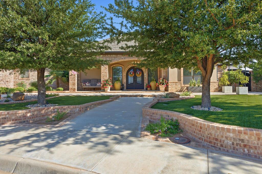 EXCEPTIONAL HOME FEAT. 4 EN-SUITE BEDRMS (4 FULL BATHS), 2 HALF BATHS & 4-CAR GARAGE! 4TH GARAGE IS HEATED/COOLED W/ ADDITIONAL STORAGE. SPACIOUS KITCHEN W/ GAS COOKTOP, DBL OVENS, ICE MAKER, WINE REFRIGERATOR, QUARTZ COUNTERTOPS, MASSIVE ISLAND, ICE MAKER, & BUTLER'S PANTRY! HUGE PRIMARY BEDRM W/ OFFICE SPACE & MASSIVE CLOSET! OUTDOOR LIVING IS TRULY ONE-OF-A-KIND—W/ HEATED POOL, GAS FIRE-AND-WATER FEATURE, FULL OUTDOOR KITCHEN, HEATERS, GENERATOR, GAS FIREPLACE & EXPANSIVE COVERED PATIO W/ ELECTRIC SHADES OFFERING MULTIPLE DINING & SEATING AREAS! TURFED PUTTING GREEN W/ CUSTOM METAL SHADE!