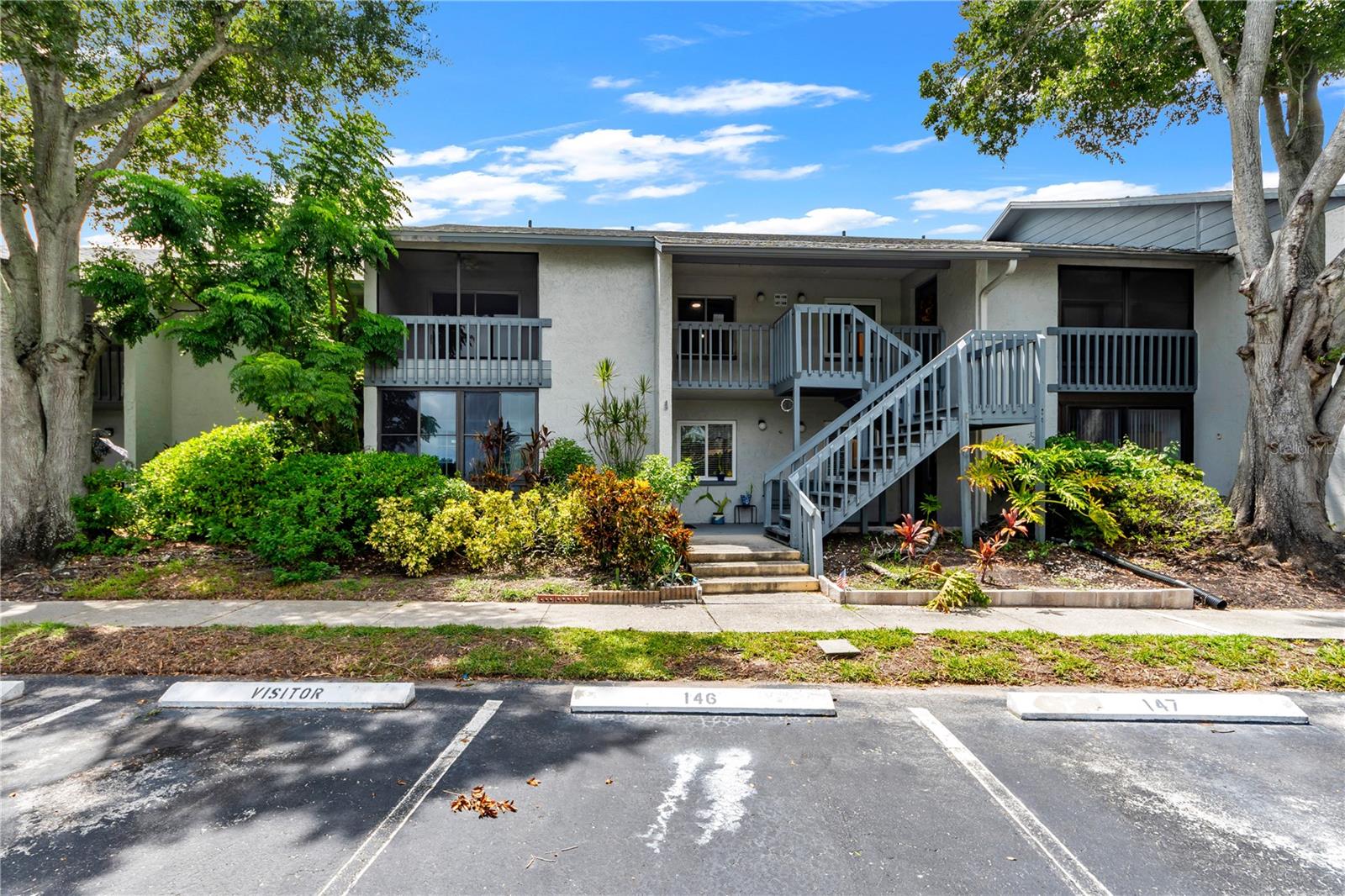 LOCATION IS EVERYTHING! Welcome to this beautifully maintained 2-bedroom, 2-bathroom condo in the highly desirable Shadow Lakes community—just minutes from Indian Rocks Beach, Madeira Beach, John’s Pass, Florida Botanical Gardens, Walsingham Park, and Largo Mall.  This move-in ready home features fresh paint, a brand-new A/C system, dual primary suites (each with its own dedicated full bath), and a private covered balcony with tranquil pond views. Enjoy assigned parking with plenty of guest spots nearby.  Unbeatable HOA Value: The $489/month fee covers Cable TV, High-Speed Internet, Water, Sewer, Trash, Exterior Maintenance, Building Insurance, and resort-style community amenities—including two lakeside pools and a covered barbecue pavilion. Low-maintenance coastal living at its finest!