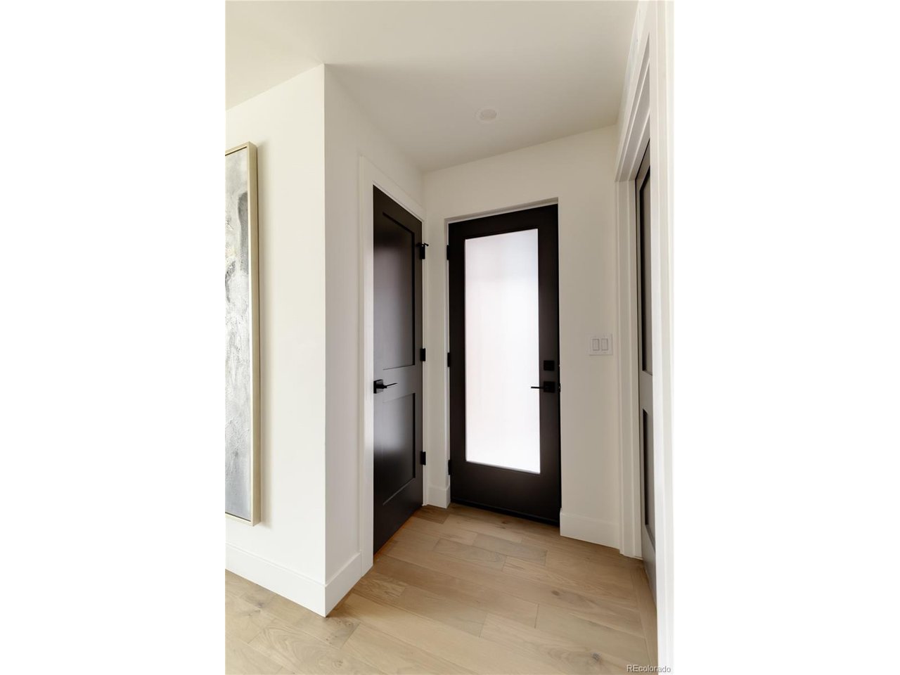 Experience brand-new city living in this thoughtfully designed 3-bedroom, 3.5-bath half-duplex offering exceptional value in Uptown Denver. This rear-position home is intentionally priced as the project's value entry point, creating a rare opportunity to own new construction at a compelling price compared to nearby resale homes.  Designed for efficiency and long-term savings, this home features upgraded energy performance with an impressive HERS rating of 45 - translating to lower utility costs and long-term value. Inside, enjoy high ceilings, contemporary design, and elevated finishes throughout, including designer lighting by Visual Comfort.  The open second-level living space is ideal for entertaining, featuring a chef-inspired kitchen with generous storage and prep space flowing seamlessly into the living area and private balcony. The upper level offers a true primary retreat with spa-inspired bath and custom walk-in closet, plus an additional en-suite bedroom perfect for guests or family. The lower level includes a third bedroom and full bath adjacent to a bonus family or media room - ideal for a home office, gym, or guest suite.  Step outside to your private fenced patio - a perfect extension of the lower-level living space for relaxing or entertaining. Enjoy immediate access to Denver's top dining, shopping, and transit while benefiting from brand-new construction, modern energy efficiency, and low maintenance ownership.  ***Taxes are estimated and will be determined prior to closing ***Party Wall agreement with no HOA*** Each home has own parcel ***Agent Owner Developer