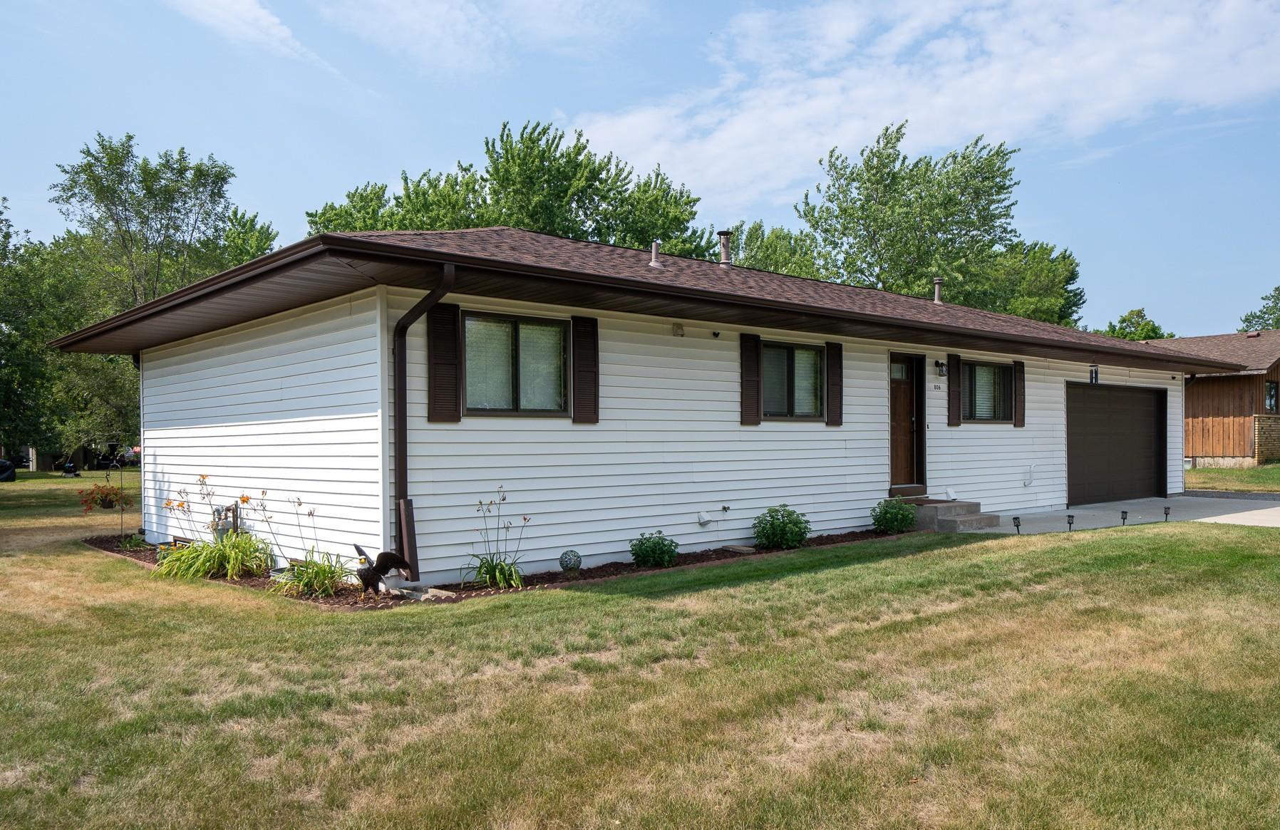 Rambler on corner lot! Many updates throughout - Spacious 5-bedroom, 2-bathroom home near downtown Saint Joseph with easy access to walking paths, parks, shops, and restaurants.  Major mechanicals are updated — new furnace, central A/C, and water heater all installed within the last year. Roof and gutters replaced in 2022. New flooring in 2024. Attached 2-stall deep garage offers extra room for storage and vehicles. Five bedrooms provide flexible space for family, home office, or guests. Great location in the Saint Joseph community with small-town convenience and charm.