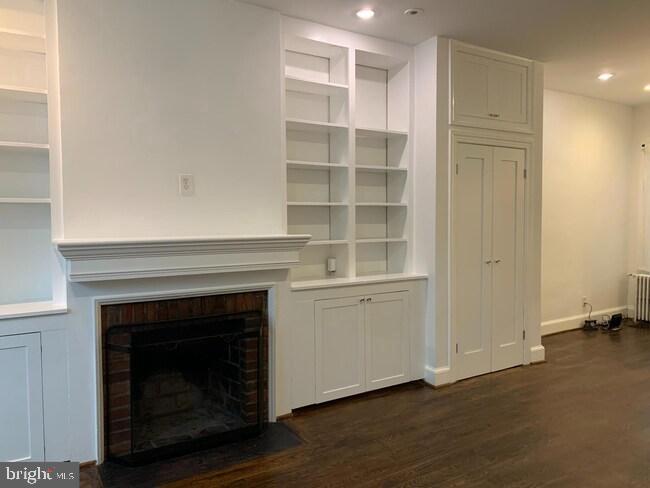 Beautiful renovations throughout, kitchen and bathrooms! Pets on a case by case. 2 bedrooms up with a full bath and 3rd bedroom  with 2nd renovated full bath in lower level with separate entrance. . Pretty hardwood floors. Situated squarely between Eastern Market and Seward Square. 0.2 mile to Eastern Market Metro-Available NOW!