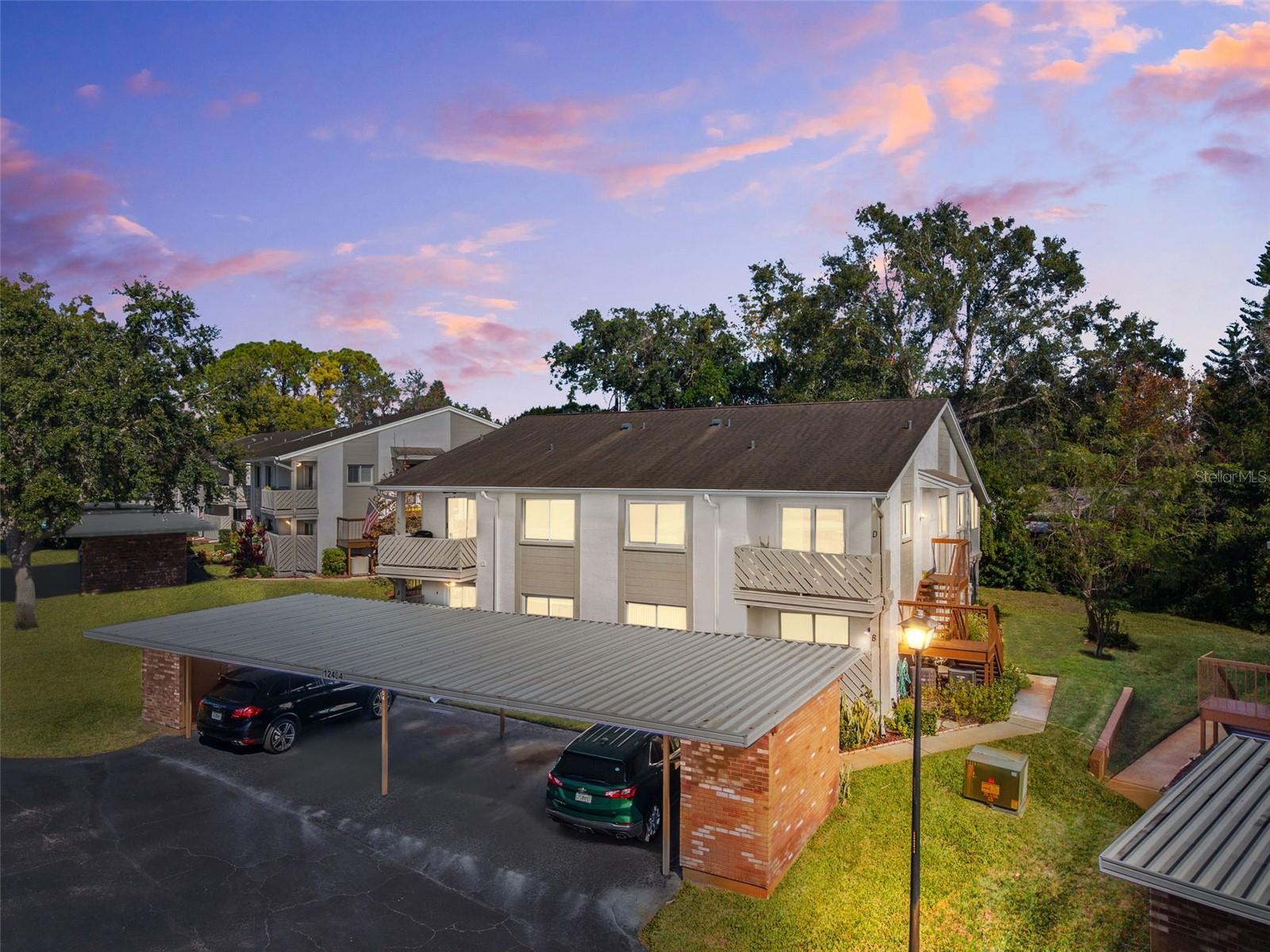 This beautifully updated 2 bedroom 2 bath condo is THE NICEST UNIT available in Eagleswood and stands out immediately for its quality and care. The seller invested over $30,000 in new impact windows and an impact door, giving the home a higher level of comfort, security, and energy efficiency that you will not find in other units. The interior was freshly painted, bedroom carpet was removed and replaced with new flooring, and the refrigerator, microwave and range have been replaced, bringing a clean, modern feel throughout.The layout features a large living area with beautiful wood floors, a separate dining room, and an open kitchen with solid surface counters. Crown molding, updated interior doors, and a California Closet system in the primary suite add to the polished and upscale feel. The screened porch off the living room provides a quiet place to relax.Both bathrooms offer generous storage with large capacity medicine cabinets, and every room feels bright, fresh, and move in ready. Compared to other units in the community, this home offers a noticeably higher level of finish and quality.Eagleswood provides a low maintenance lifestyle with exterior maintenance included, a community pool, and access to all Beacon Woods amenities including tennis, shuffleboard, golf, and the Eagleswood clubhouse located just across the road.If you want a premium updated condo in a quiet and friendly 55 plus community, this is the one to see first.