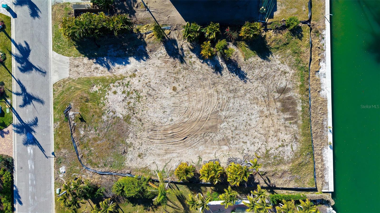 Beautiful lot on one of the most desirable streets on north Longboat Key with a very wide canal that leads directly to Sarasota Bay and the intracoastal waterway. Emerald Harbour is right off Gulf of Mexico Dr . Close to Beautiful Lbk beach, restaurants, and shopping. Build your Florida dream home  and enjoy, boating, fishing and the Beach.