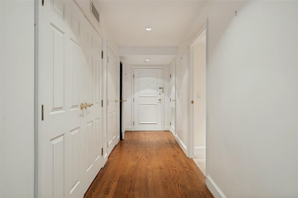 Luxury 3 bedroom, 3 bath residence in the coveted North Building of the renowned Crestpark. Occupying the entire north wing, this exceptional home offers unmatched privacy and abundant natural light through expansive floor-to-ceiling windows with eastern, western, and northern exposures. Located within Highland Park ISD and served by Highland Park Police and Fire, the residence is conveniently situated near the lobby and two fitness centers. Professionally updated throughout, the home features Venetian plaster walls, marble and hardwood flooring, a fireplace, custom shutters, and sophisticated recessed lighting. Elegant wainscoting showcases fresco-secco paintings of Italy by a prominent local artist, creating a truly distinctive interior. The beautifully renovated baths include 18-inch marble tile floors, Newport Brass fixtures, designer lighting, and updated mirrors. Additional highlights include five walk-in closets and a full-size washer and dryer. Residents enjoy an elegant entrance lobby with 24-hour security, concierge, doorman, and valet services, along with a resort-style pool and spacious patios. Ideally located within walking distance of Highland Park Village and Whole Foods, with convenient access to the Dallas North Tollway.