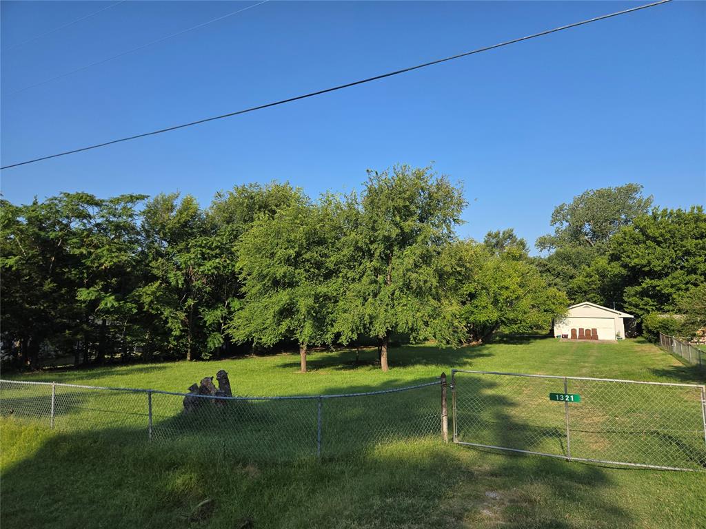 Hard to find half-acre(mol) building lot with a workshop in Midwest City limits that feeds into the Choctaw-Nicoma Park Schools District. This lot has approximately 107 feet of frontage by 200 feet of depth. The workshop has approximately 808 square feet and sets at the back of the property.