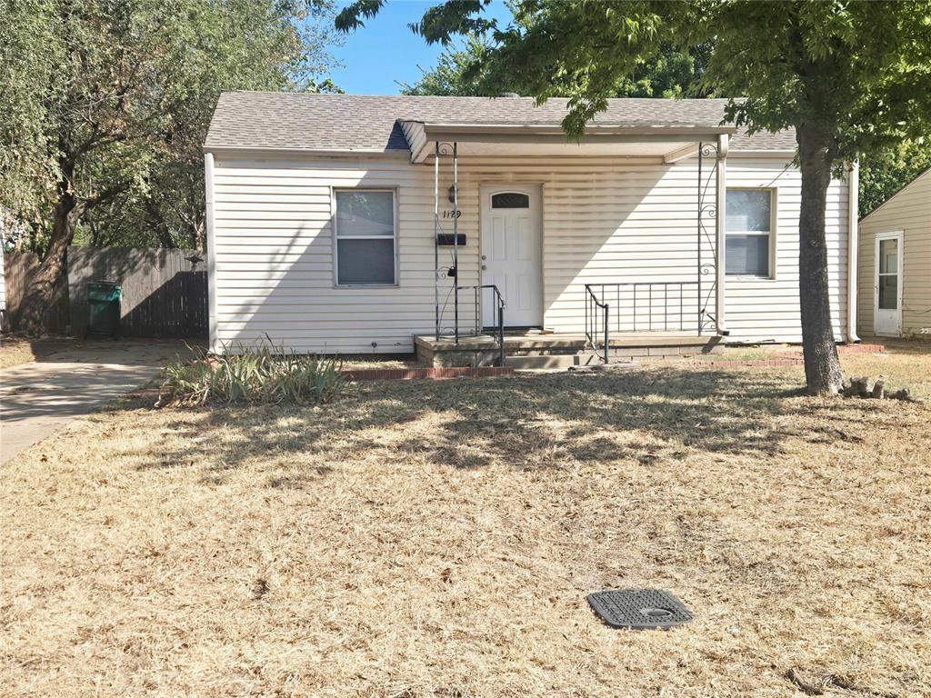 Wow! What a great little home in a great location. Home features hardwood flooring throughout. The living room is open next to the kitchen, which features all white cabinetry and a stainless steel gas stove. Both bedrooms are a great size, and the bathroom has been tastefully updated. Utility room is located off the back of the home. Enjoy a large, fully privacy fenced yard and off street parking. Conveniently located just off Western and close to everything. Two year minimum lease required. This is the perfect little home you have been looking for, so reach out for your private viewing today!