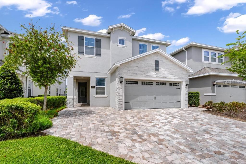 Welcome to 401 Southfield Street, a beautifully maintained turnkey vacation home located in the highly sought-after Encore Resort at Reunion, one of Orlando's premier short-term rental communities just minutes from Walt Disney World.Offering 5 bedrooms, 4.5 bathrooms, a private heated pool and spa, and an exceptional open-concept floor plan, this home presents a rare opportunity for buyers seeking a profitable vacation rental investment, second home, or luxury primary residence in Central Florida.From the moment you enter, you'll appreciate the bright and spacious layout designed for both relaxation and entertaining. The gourmet kitchen features quartz countertops, stainless steel appliances, 42-inch cabinetry, and a large island overlooking the dining and living areas. A first-floor bedroom and full bathroom provide convenient accommodations for guests or owners who prefer single-level living.Upstairs, you'll find a versatile loft space ideal for a game room, media area, or additional guest retreat, along with four additional bedrooms including a spacious primary suite designed as a peaceful escape after a day enjoying everything Orlando has to offer.Step outside and discover what truly sets this property apart. Unlike many resort homes, this home offers a rare sense of backyard privacy. Enjoy Florida living at its finest with a custom heated swimming pool, spillover spa, oversized brick-paver sun deck, outdoor shower, and dedicated pool bath—creating the perfect setting for vacation guests and owners alike.Located just 6.5 miles from Walt Disney World, Encore Resort at Reunion offers world-class amenities including a guard-gated entrance, multi-acre AquaPark with water slides, resort clubhouse, fitness center, sports courts, on-site dining, concierge services, and complimentary theme park transportation.Whether you're searching for a vacation home near Disney, an Airbnb investment property in Orlando, a short-term rental opportunity, or a luxury Florida getaway, tgis property delivers the location, amenities, flexibility, and income-producing potential that today's buyers are looking for.Schedule your private showing today and discover why Encore Resort remains one of Central Florida's most desirable vacation home communities.
