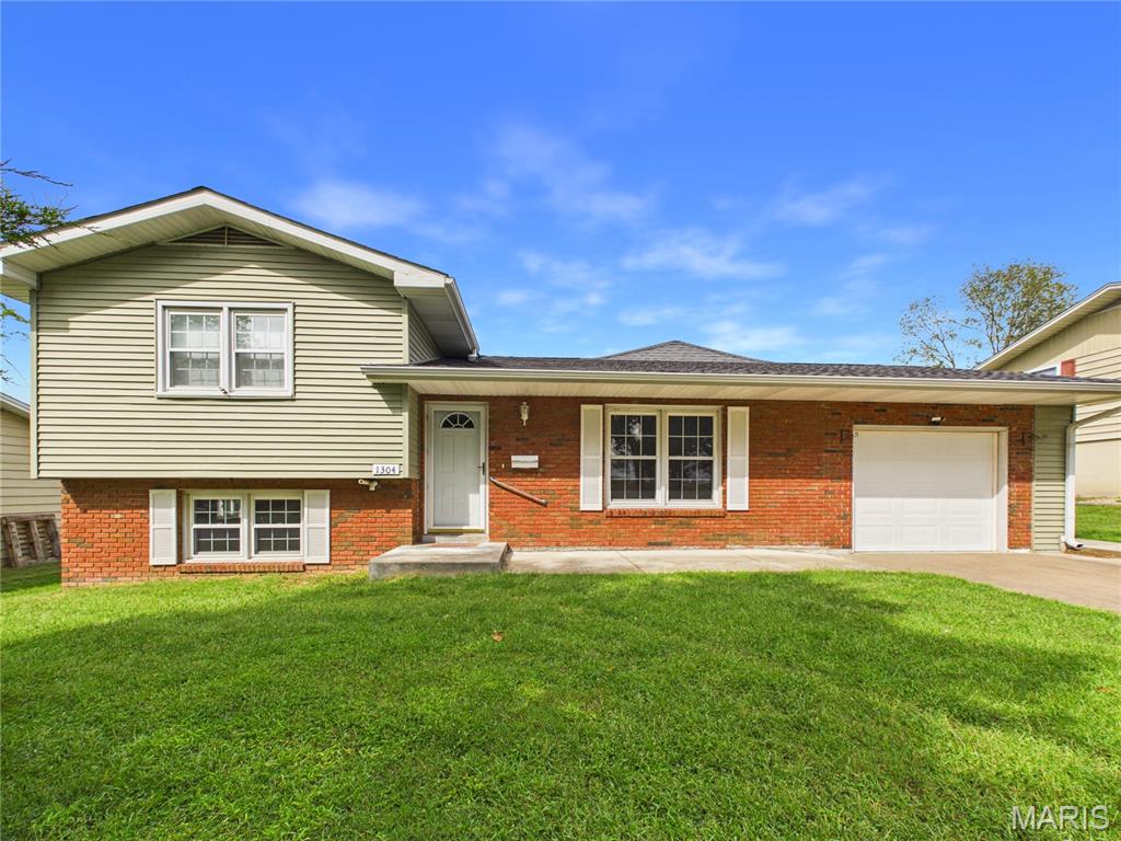 Welcome to this unique home nestled in the quaint town of Scott City. Inside you will find fresh white paint making it ready for you to add your personal touch. The living room and upper bedrooms have original hardwood while the rest of the main level has been fitted with luxury vinyl tile. Lower level boasts an additional living room or sleeping space, the possibilities are endless. Outside you will find a large workshop ready to become your favorite place. With a bay door for easy access, plenty of open workspace and a finished interior room, the options are wide open. The home also has a whole home generator giving you reliable power when it's needed the most.