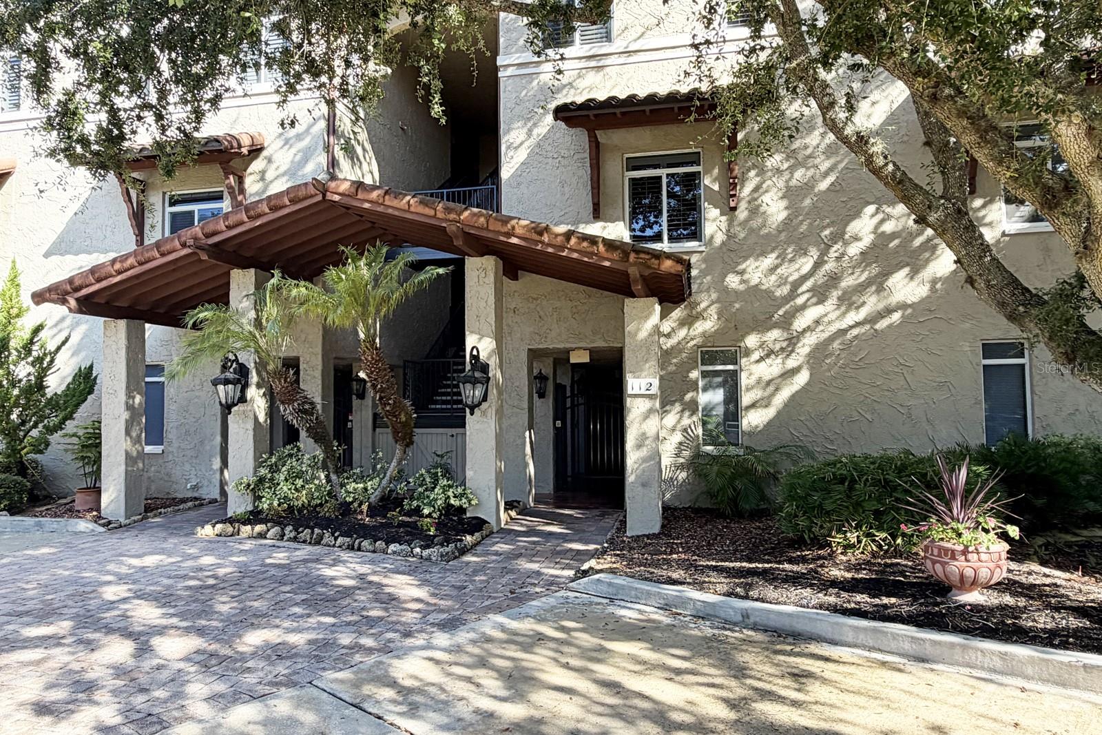 Virtually Staged. Welcome to your new home in Palm Coast, where comfort, convenience, and value come together! This first floor, 2-bedroom, 2-bathroom condominium features a desirable split-bedroom floor plan and an impressive 2,297 square feet of living space.  Competitively priced, this home offers one of the largest square footage options at this price point, along with the added convenience of an attached oversized garage, a rare and highly desirable feature!  Inside, you'll find tile flooring throughout and a spacious living room that flows seamlessly into the dining area and kitchen, creating an inviting space for everyday living and entertaining. Enjoy community amenities including a pool, fire pit, and outdoor kitchen. Conveniently located near the European Village, shopping, restaurants, and a golf course, this condominium offers an exceptional combination of space, value, amenities, and location. Schedule your private showing today