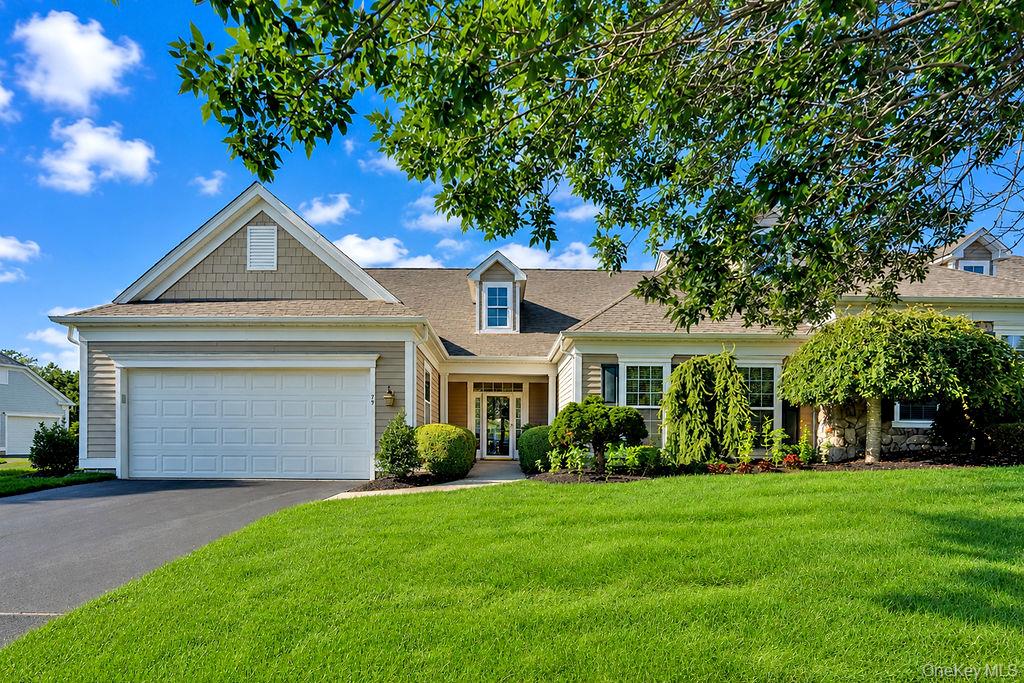 Welcome to easy, elegant living in Westhampton Pines, a sought-after 55+ community. This bright, airy and sun-filled Amagansett model offers approximately 2440 square feet of beautifully designed living space and an Open-Concept Floor Plan, all on one level. Gracious living and dining areas are complemented by a beautiful appointed gourmet kitchen with custom cabinetry, a center island and breakfast area. The spacious living room features a gas fireplace and a wall of windows that fill the home with natural light, while a comfortable library/den provides flexible living space. The private primary suite features a generous bath and walk-in closet, while a guest bedroom and full bath provide comfortable accommodations for family and friends. Outdoors, enjoy a private patio and an expansive rear lawn bordered by protected woodlands, creating a peaceful and private setting. Westhampton Pines offers an impressive 8100 square-foot clubhouse with indoor and outdoor pools, tennis and pickleball courts, bocce, fitness center, library and game room. An active Social Committee offers a full calendar of activities each month throughout the year.  Low taxes and 24 hours security further enhance the ease of living in this exceptional community.  Just minutes from the Charming Village of Westhampton Beach and with access to the Town of Southampton's beautiful beaches,  Westhampton Pines truly offers an exceptional combination of comfort, convenience, community and Hamptons living. Everything you need to live your best life is right here.