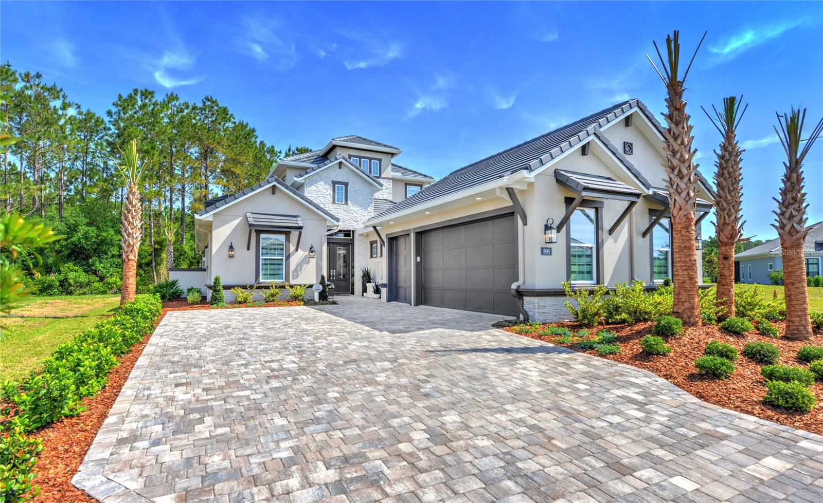 New Construction- Available with Leaseback! Own an award-winning model home with ALL the UPGRADES including a pool at the gated golfing community of The Conservatory with a unique opportunity to purchase now with leaseback. Welcome to the brand new Avina II, recognized with the Grand Award in the 2026 Flagler Parade of Homes and the Award of Excellence in the 2026 Volusia Parade of Homes. With over 3,000 square feet of living space, this thoughtfully designed home blends sophisticated style with everyday comfort. From the moment you enter through the inviting courtyard, the Avina II opens into a seamless flow of open-concept living. The expansive living room, dining area, and chef-inspired kitchen create a central hub designed for both entertaining and daily life. A spacious island, walk-in pantry, and large sliding glass doors connect the indoors to the covered lanai, offering a true indoor-outdoor living experience. The first-floor primary suite offers a private retreat, complete with a spa-inspired bath and generous walk-in closet. Additional bedrooms and a versatile flex room provide space for work, hobbies, or guests, giving the home flexibility to match your lifestyle. Upstairs, a spacious bonus room, additional bedroom, and full bath create the perfect setting for entertaining, multigenerational living, or a private guest retreat. An extended balcony adds another layer of outdoor enjoyment, offering a peaceful place to relax and take in the surroundings. High-end finishes are featured throughout, reflecting quality craftsmanship and attention to detail. Residents also have the opportunity to join the exclusive Hammock Beach Club, offering access to an unparalleled resort lifestyle including two signature golf courses—the Tom Watson-designed Conservatory Course and the Jack Nicklaus-designed Ocean Course—private beach access, resort-style pools, a full-service spa, upscale dining and social clubs, tennis courts, state-of-the-art fitness facilities, and miles of scenic walking and biking trails. Enjoy the very best of coastal Florida living, from pristine beaches and boating to world-class fishing and nearby nature preserves—all just moments from home.