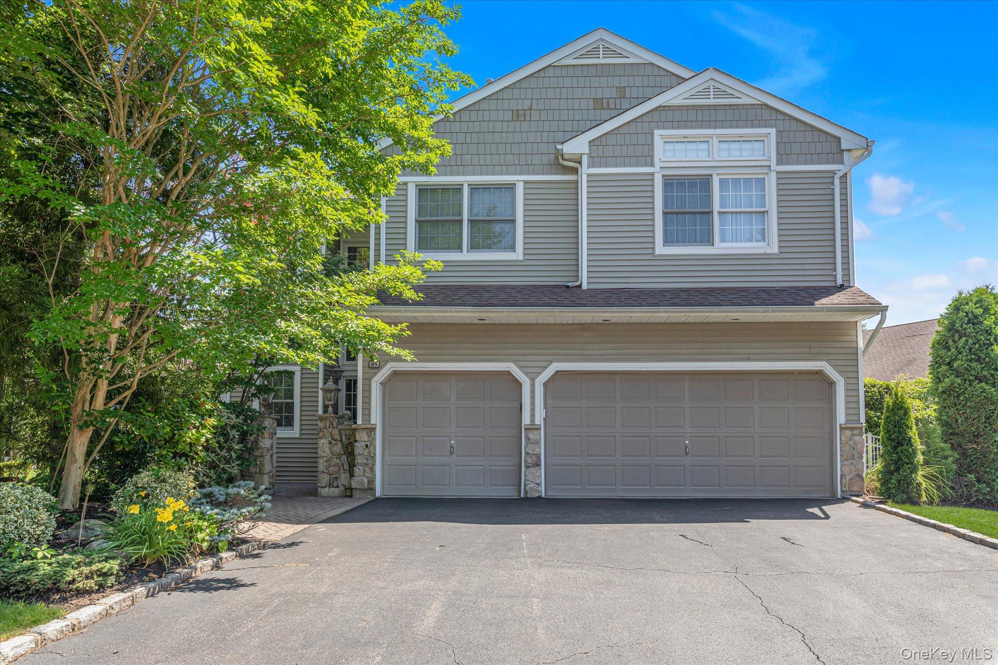 Welcome to 85 Sagamore Drive in the Hamlet in Plainview.  One of only 16 units on the lake in one of the most Prestigious Communities on Ling Island.