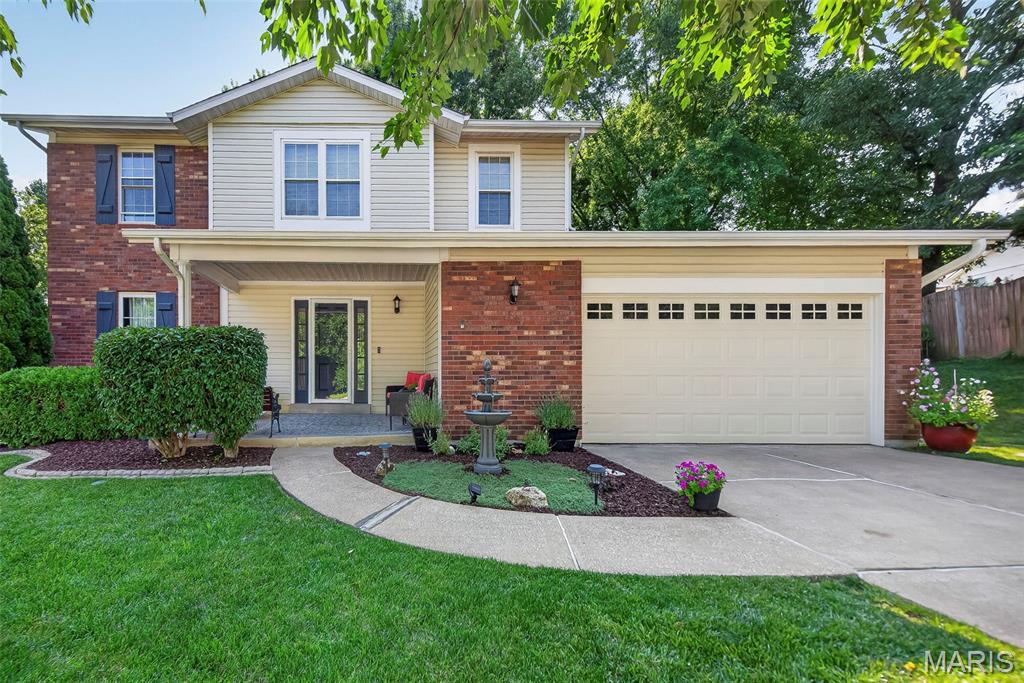 Gorgeous, impeccably maintained two-story home nestled on an incredible cul-de-sac lot on a quiet street in St. Peters, within the highly desirable Francis Howell School District! From the moment you arrive, you'll appreciate the stunning landscaping and exceptional pride of ownership throughout. The beautifully updated kitchen features custom cabinetry, granite countertops, stainless steel appliances, a pantry, recessed lighting, and a spacious center island perfect for gathering and entertaining. The main level showcases luxury vinyl plank flooring, crown molding, recessed lighting, and an abundance of natural light. Step down into the inviting family room featuring a gorgeous brick gas fireplace and sliding glass doors leading to a beautiful two-tiered deck. Convenient main-floor laundry completes the level.Upstairs, you'll find a spacious primary suite with a walk-in closet and private bath, along with three additional generously sized bedrooms and a full hall bath. The lower level offers a finished workout room or home office, along with an abundance of shelving for organized storage.The backyard is truly an entertainer's dream! Enjoy your own private outdoor retreat featuring an above ground swimming pool, three decks, a large storage shed, and absolutely gorgeous landscaping. The beautifully maintained grounds extend from the front yard to the backyard, creating incredible curb appeal and inviting outdoor living spaces.Owned and meticulously cared for by a skilled carpenter, the attention to detail and quality craftsmanship are evident throughout. Ideally located on a quiet cul-de-sac street in St. Peters, just minutes from shopping, restaurants, and everyday conveniences. This exceptional home offers the perfect combination of comfort, craftsmanship, and outdoor living. A rare find!