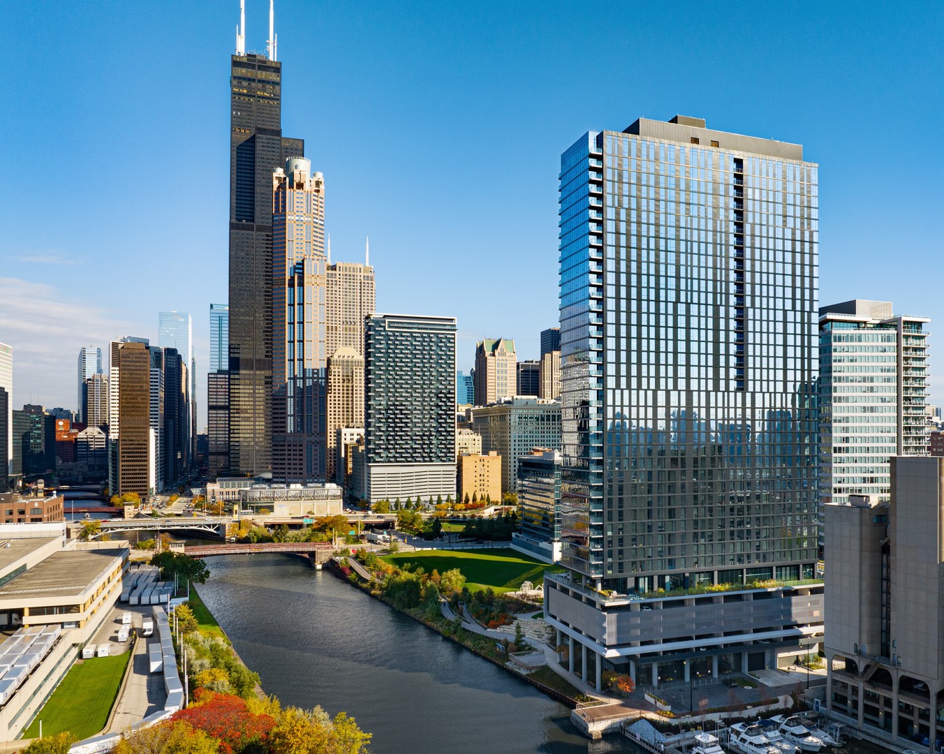 Experience sophisticated urban living like never before at The Reed, a brand-new luxury riverfront development in Chicago's Southbank neighborhood. Designed for exceptional lifestyles - this sustainable development by Lendlease, designed by Perkins + Will, offers first class amenities, sleek industrial-led design, direct Riverwalk and park access and stunning views. Thoughtfully curated, premier amenities with a focus on wellness include a dedicated fitness club with outdoor terrace, strength and motion studios, weekly fitness classes, massage room, salon, interactive sports simulator and media room. Additional private amenities that are the definition of next-level living include serene co-working and study spaces, upscale kitchen with private dining, plush lounges, 15,000 SF outdoor amenity deck, complete with a pool and cabanas, patio lounge with fire pits, open-air kitchen and grilling area with al fresco dining spaces. Residence 2501 features floor to ceiling windows, wide-plank hardwood flooring, spa-like bath and custom kitchen with sleek cabinetry, quartz counters, tile backsplash and Bosch panel appliances. Full-service building including 24-hr door staff, in-unit package service, drop-off dry cleaning services and more. Secure, indoor parking available. Condos delivering now and model residences now available for viewing by appointment daily!