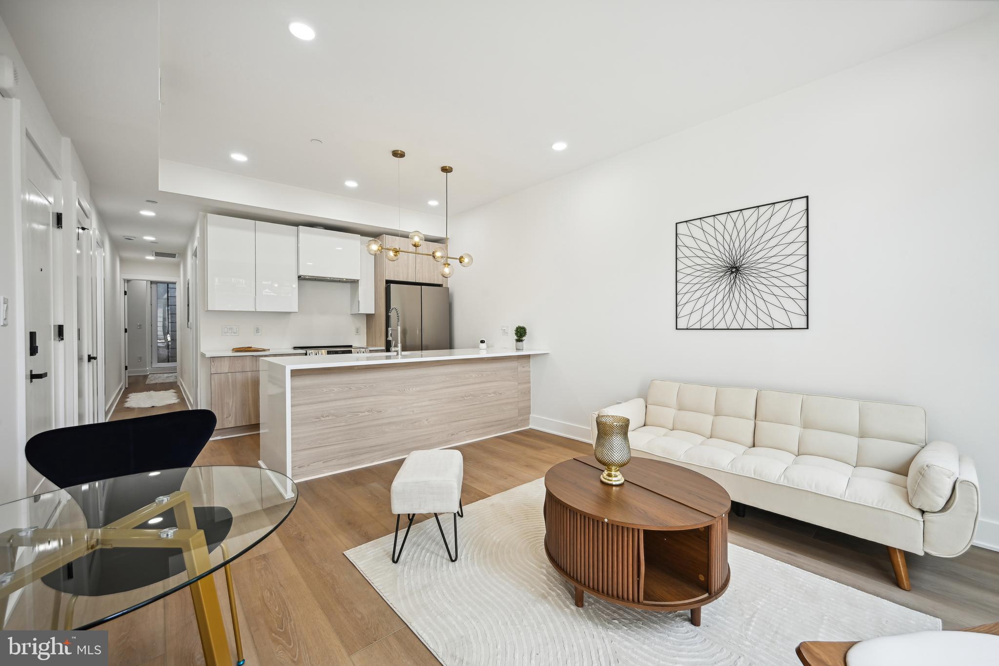 LOW CONDO FEE! 2% RATE  BUYDOWN! Welcome to 1372 Bryant Street NE, an exceptional new construction building near all the fun in DC! Each unit is punctuated with attractive details throughout, including Engineered Hardwood floors, dramatic custom lighting, and oversized windows delivering beautiful neighborhood views. Unit 2 features open concept living and dining areas with ample room to stretch out, entertain, and usable patio with lots of natural lights. This flows right into the stunning modern kitchen equipped with quartz countertops waterfall Island , custom European cabinetry, and a premier stainless steel appliance suite. The home features two gracious bedrooms, generous closet spaces, with two full baths! The home is conveniently located only a few steps away from many amenities including a bus station, Home Depot, Giant Grocery Store, and US Social Security Administration building. This is city-living at its finest! Parking available for purchase!