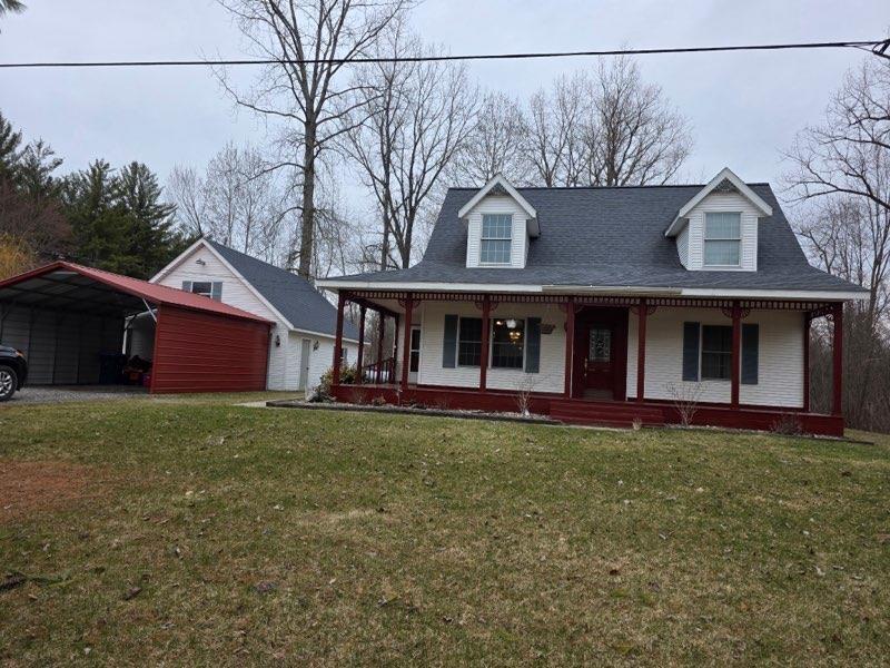 Discover 2283 River Road in Beaverton, Michigan-a well-cared-for property offering comfort, space, and privacy. This home features three bedrooms and two full bathrooms, set on 7.38 acres of predominantly wooded land. The kitchen was completely updated in fall 2025 and showcases new granite countertops, oak cabinetry, updated flooring, brand-new appliances, and new carpet on the upper level. Enjoy peaceful evenings on the charming wraparound porch, an ideal spot for taking in summer sunsets. The spacious garage provides ample storage for vehicles and recreational equipment, complemented by an additional carport for added convenience.